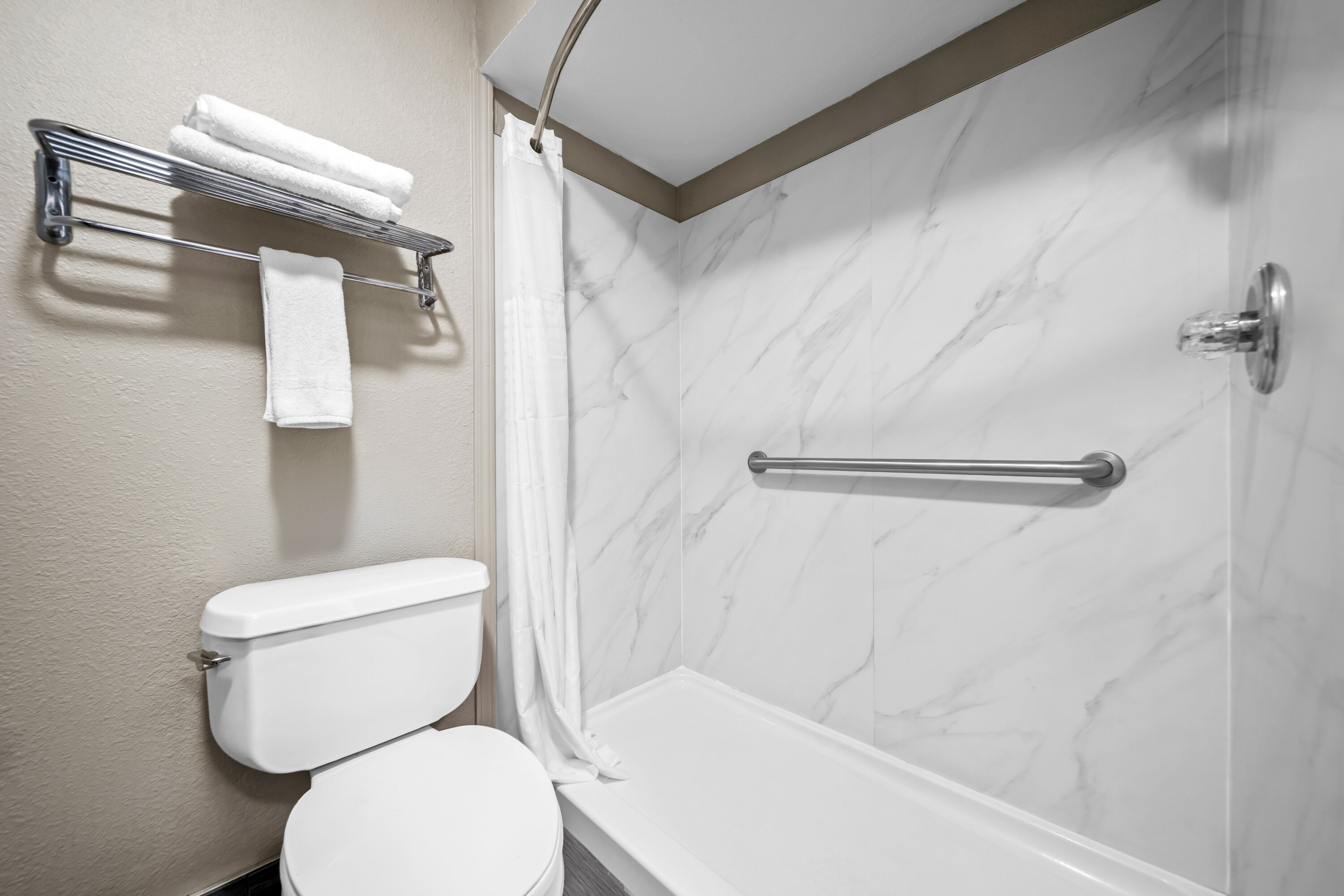 Guest room bath at the Days Inn by Wyndham Troy in Troy, Alabama