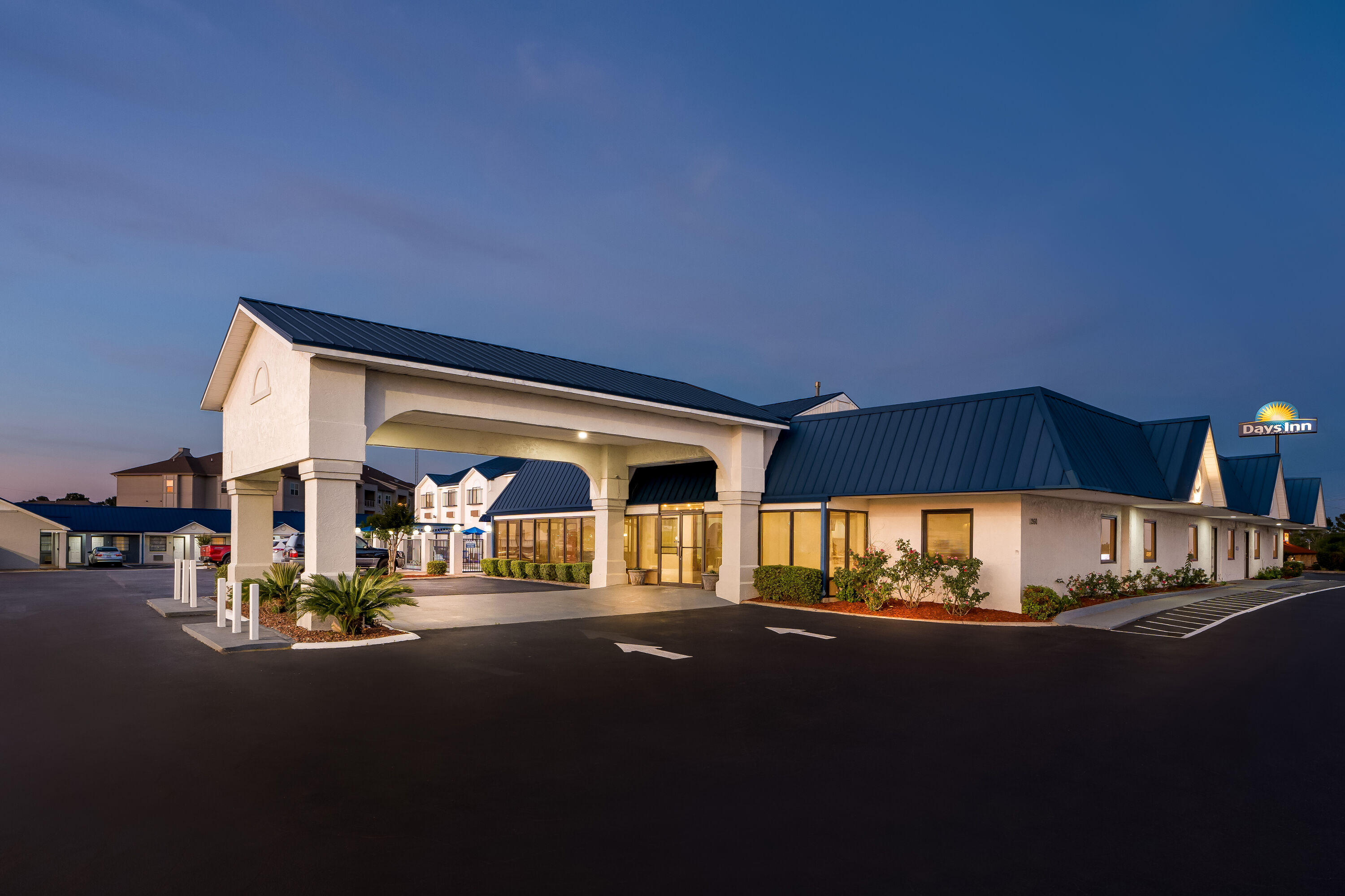 Exterior Night Image of Days Inn by Wyndham Troy hotel in Troy, Alabama