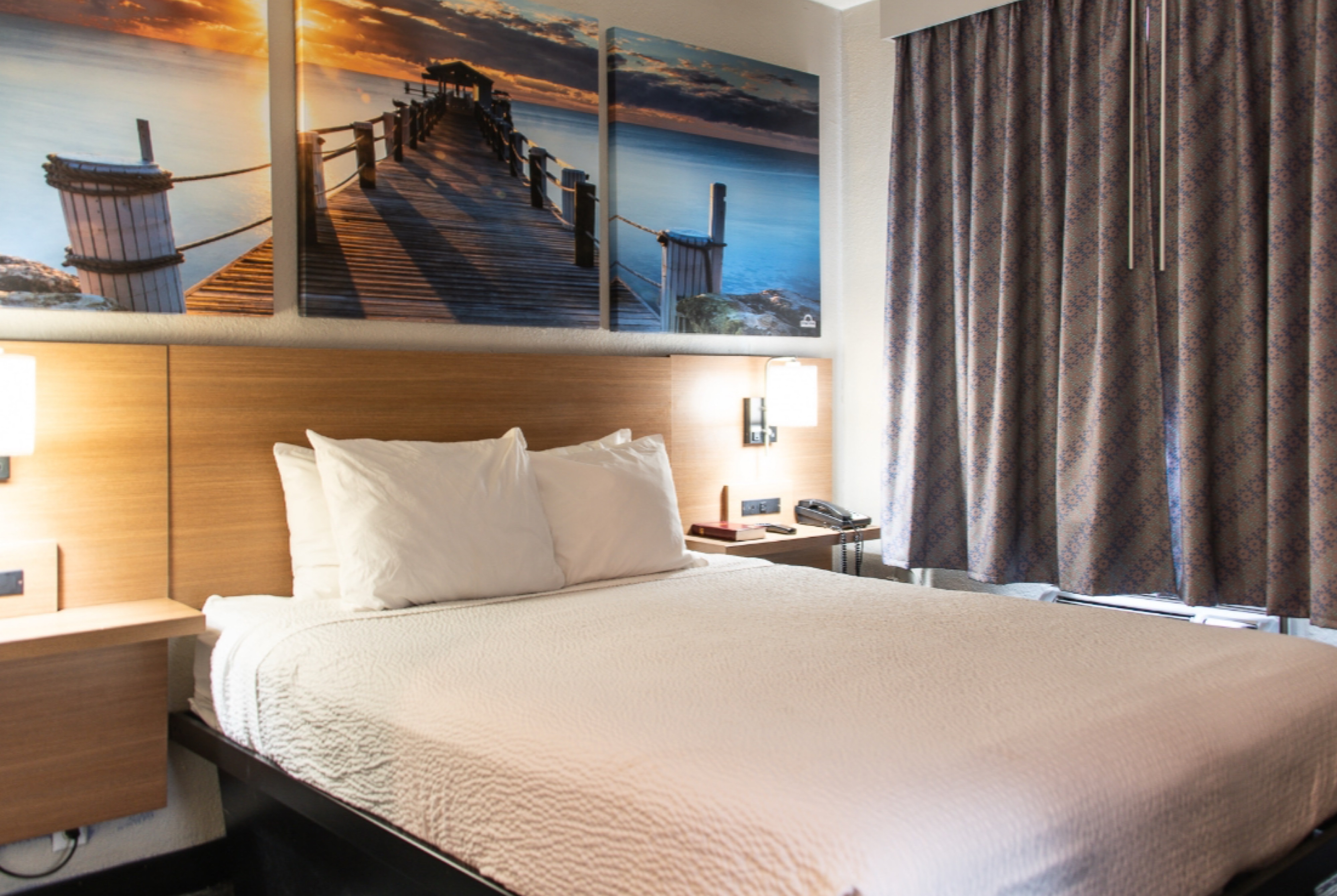 Guest room at the Days Inn by Wyndham Troy in Troy, Alabama