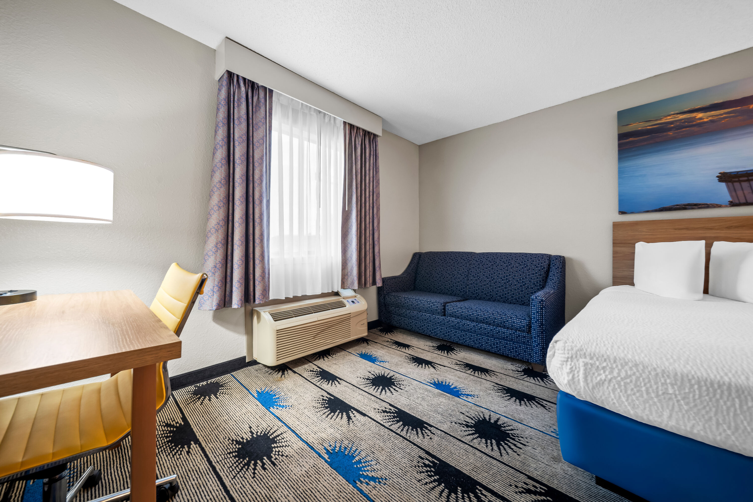 Double bed guest room at the Days Inn by Wyndham Troy in Troy, Alabama
