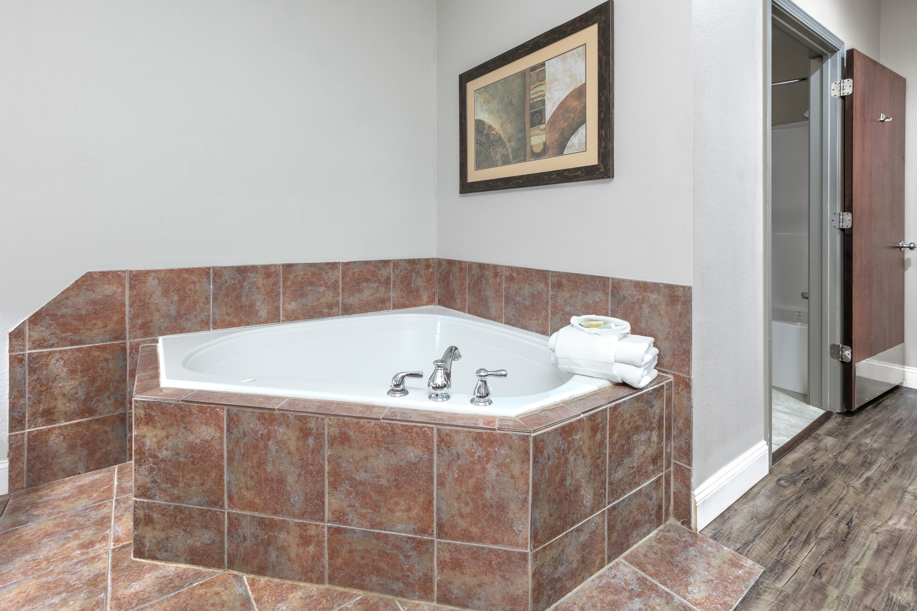 Guest room at the Days Inn & Suites by Wyndham Cabot in Cabot, Arkansas