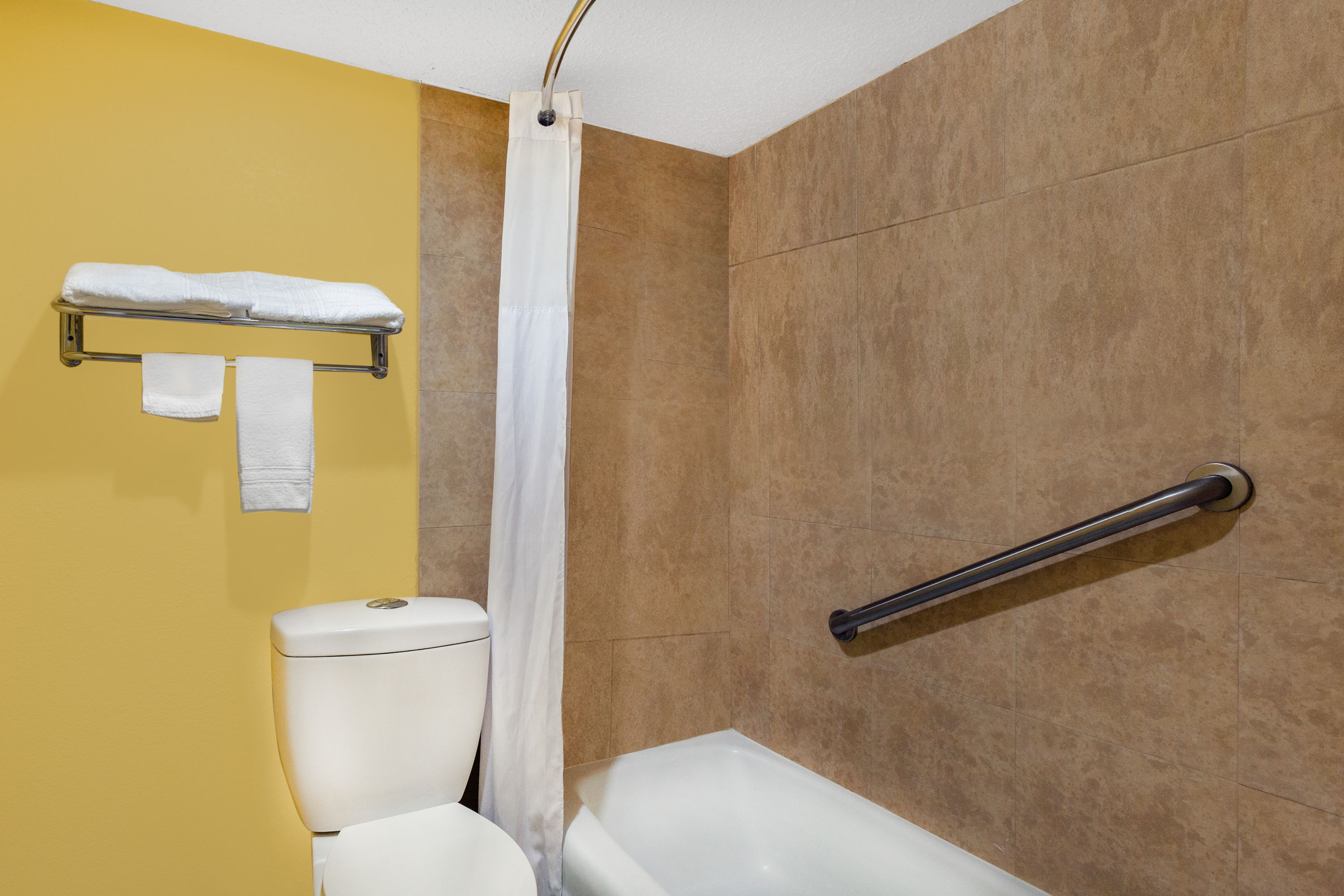 Guest room bath at the Days Inn by Wyndham Jacksonville in Jacksonville, Arkansas