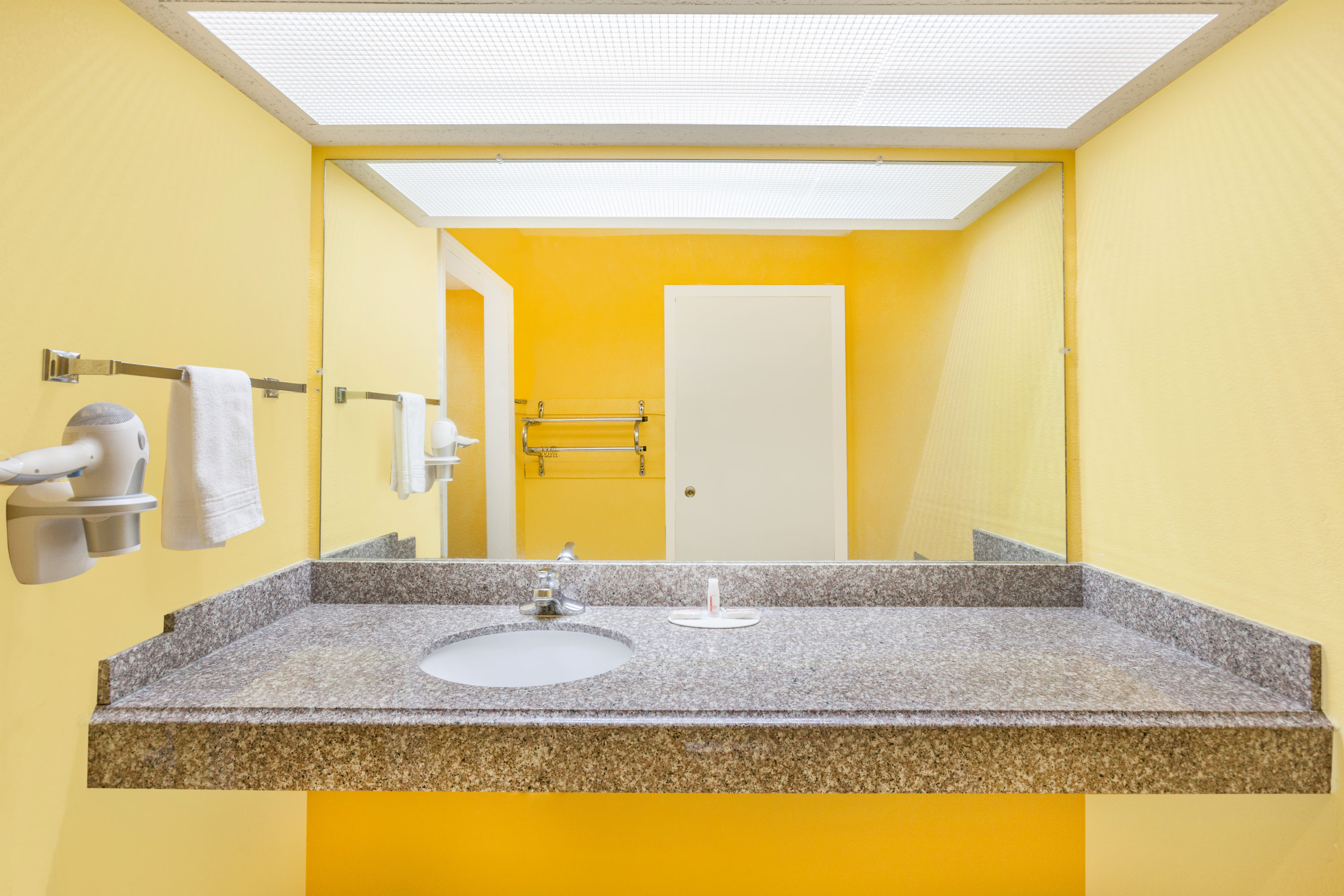 Guest room bath at the Days Inn by Wyndham Jacksonville in Jacksonville, Arkansas