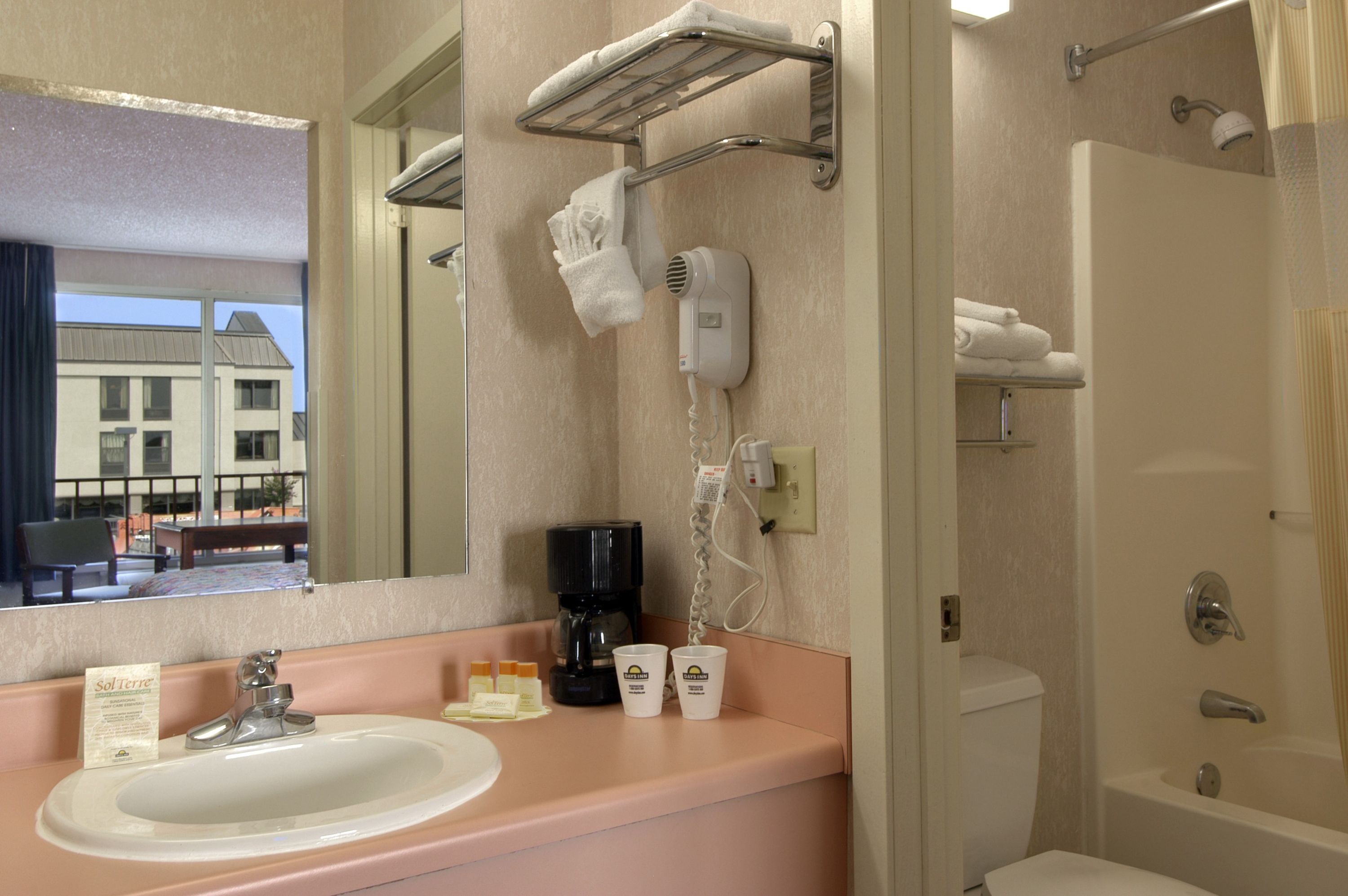 Guest room at the Days Inn by Wyndham Jonesboro AR in Jonesboro, Arkansas