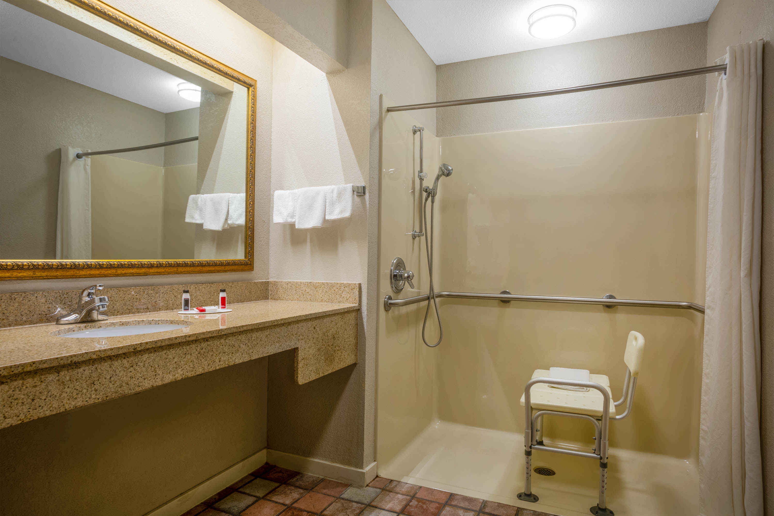 Guest room bath at the Days Inn by Wyndham Lonoke in Lonoke, Arkansas