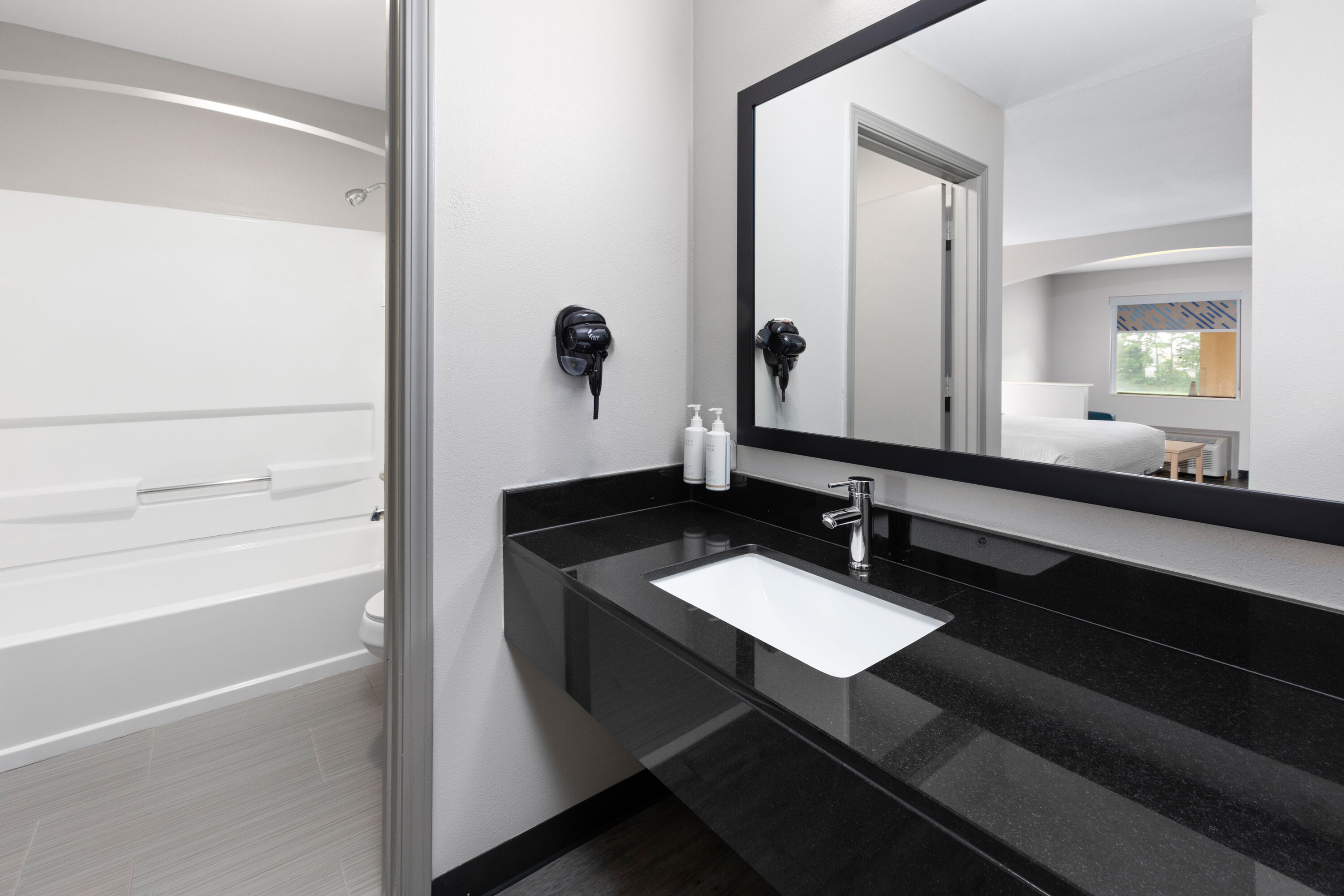 Guest room bath at the Days Inn by Wyndham North Little Rock/ Maumelle in North Little Rock, Arkansas