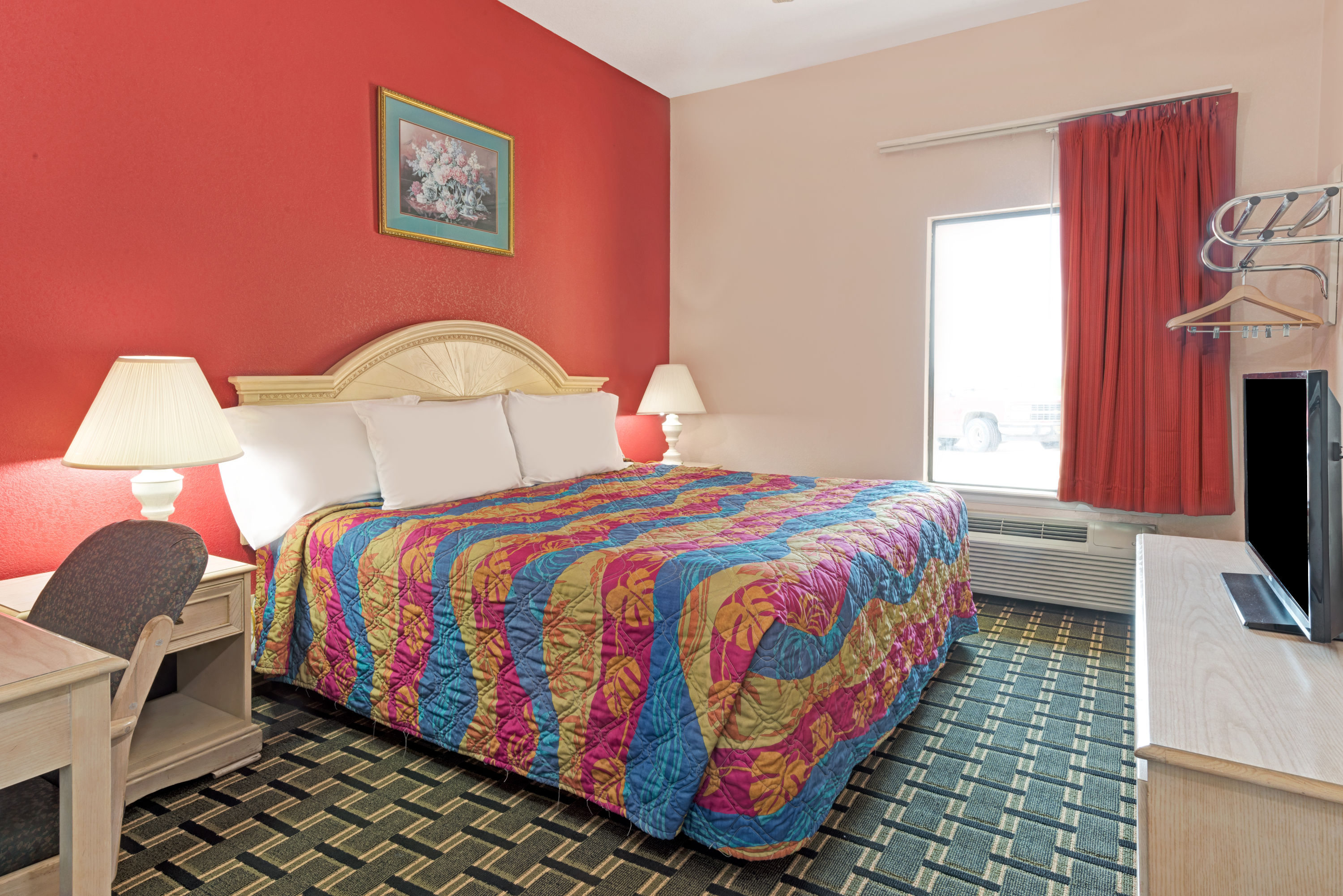 Guest room at the Days Inn & Suites by Wyndham Osceola AR in Osceola, Arkansas