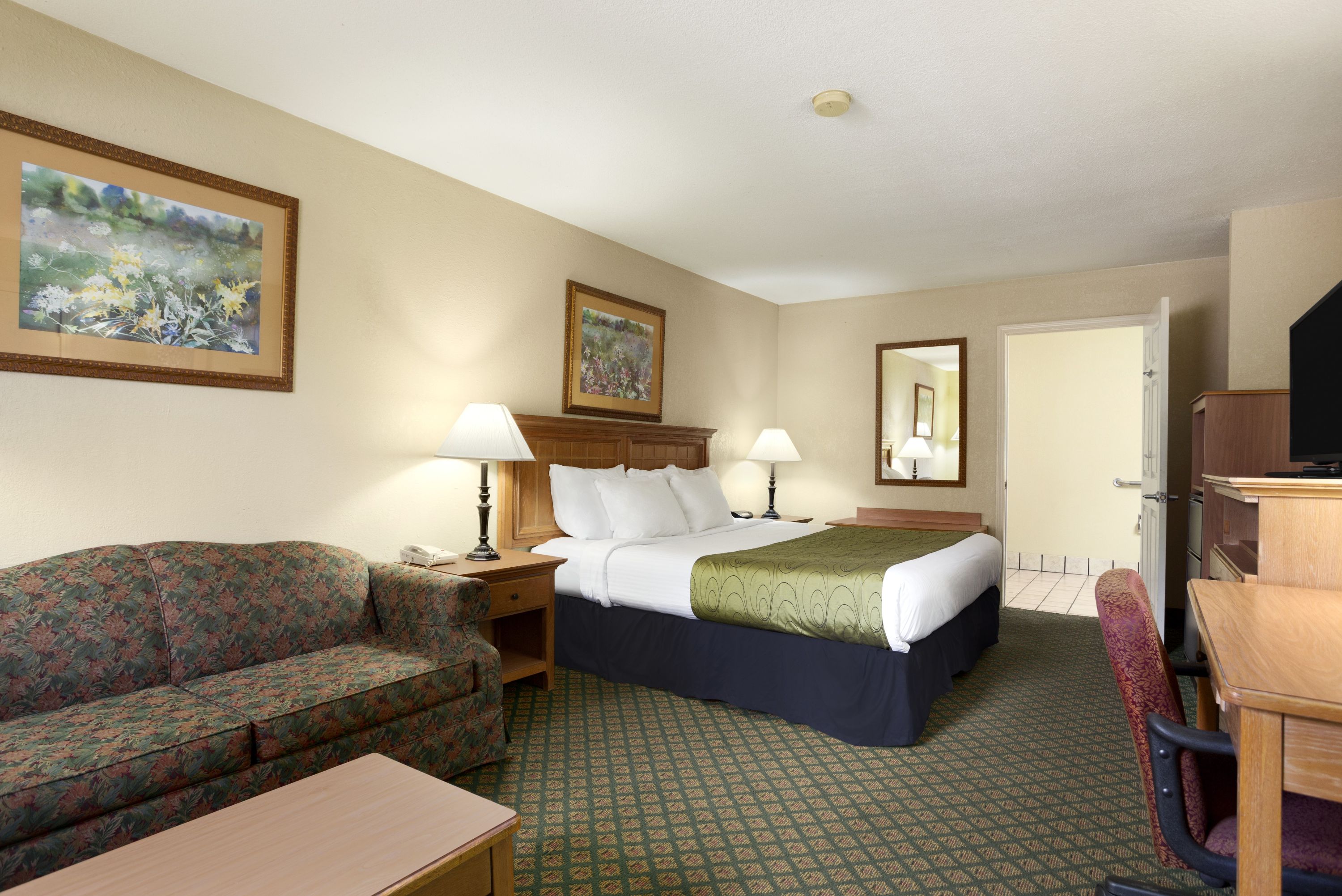 Guest room at the Days Inn & Suites by Wyndham Stuttgart in Stuttgart, Arkansas