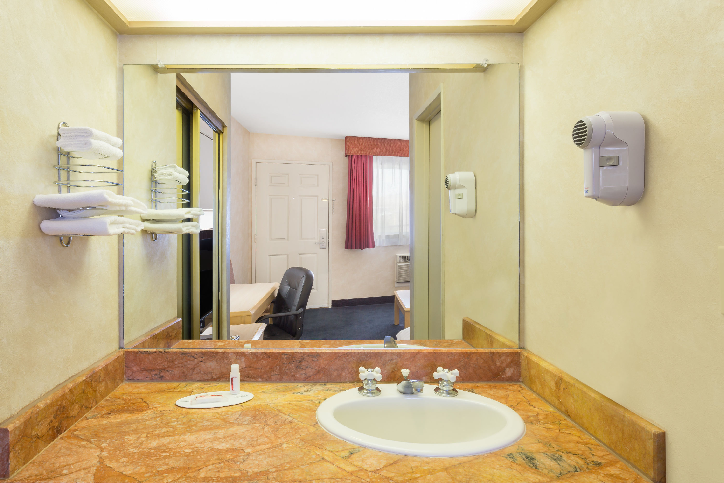 Guest room bath at the Days Inn by Wyndham Bullhead City in Bullhead City, Arizona