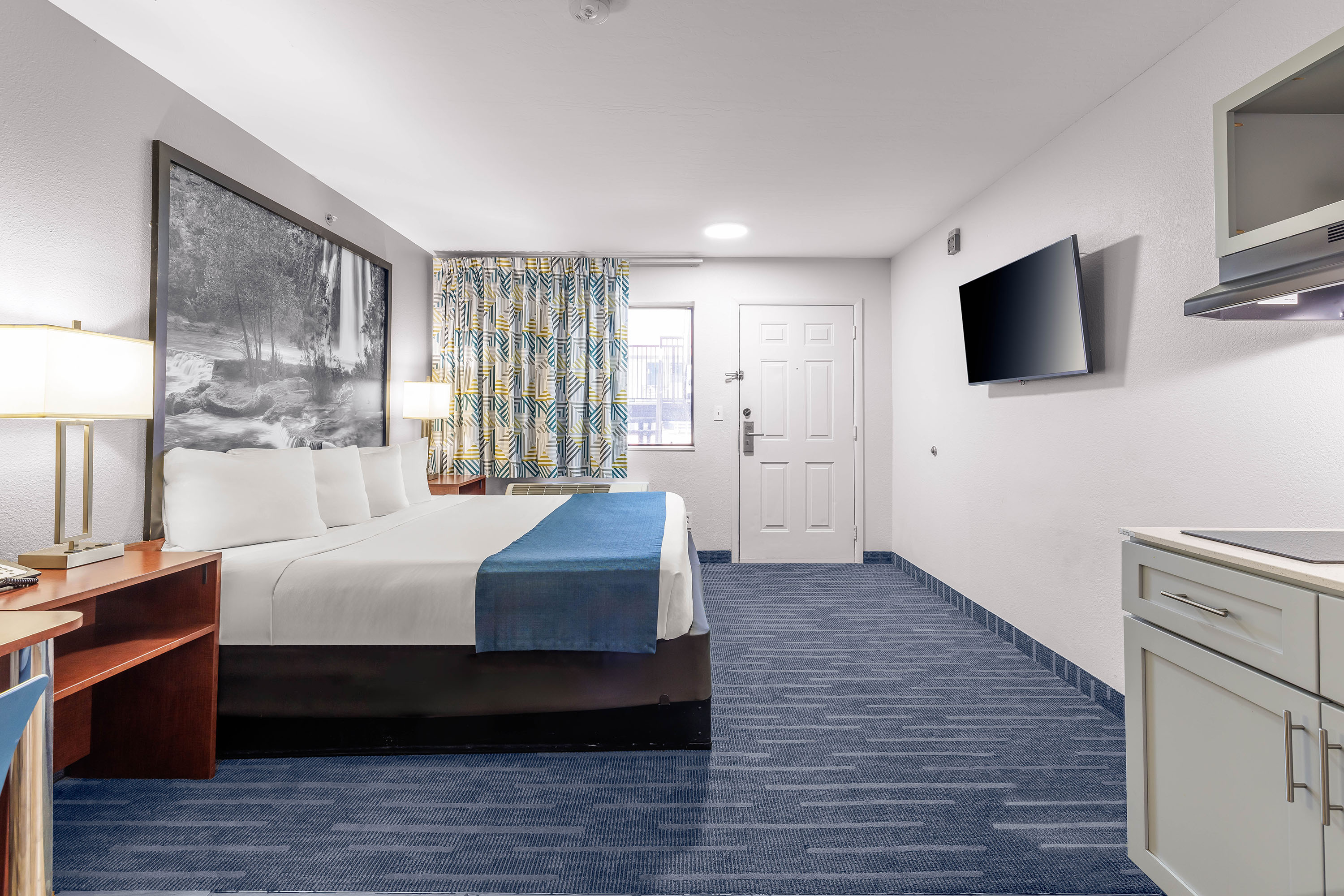 Guest room at the Days Inn & Suites by Wyndham Flagstaff Near University in Flagstaff, Arizona