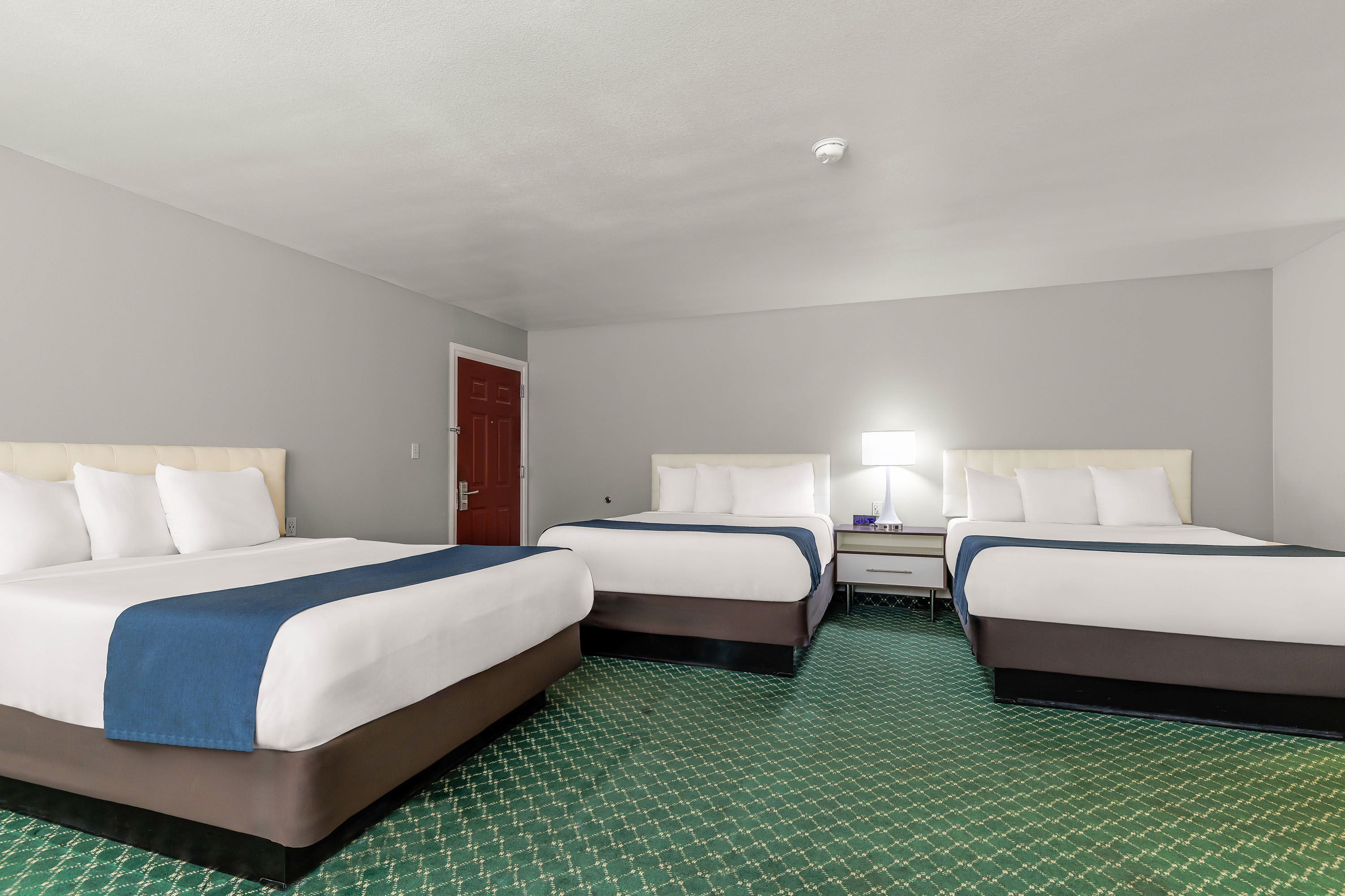 Guest room at the Days Inn & Suites by Wyndham Flagstaff Near University in Flagstaff, Arizona