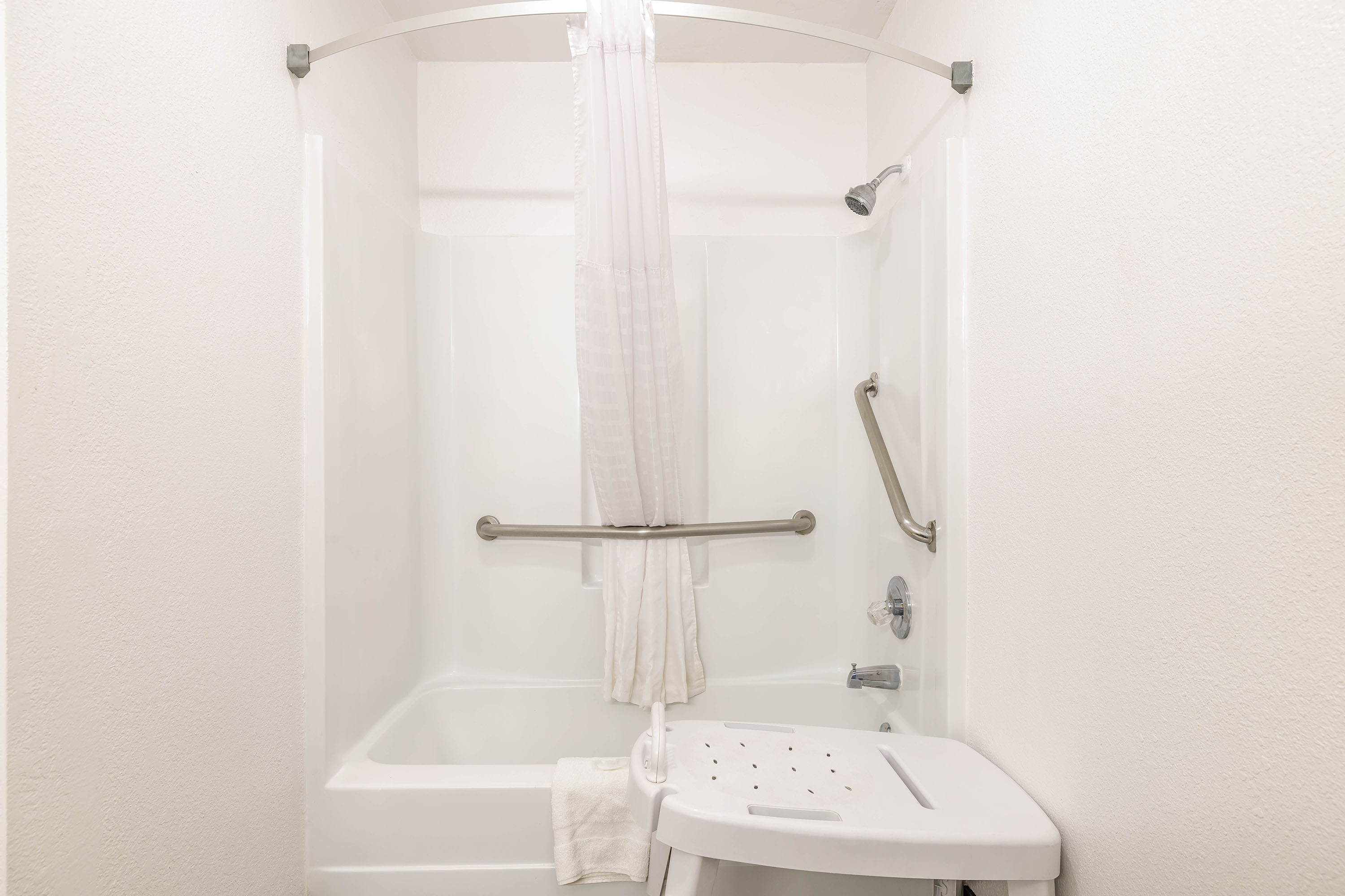Guest room bath at the Days Inn & Suites by Wyndham Flagstaff Near University in Flagstaff, Arizona