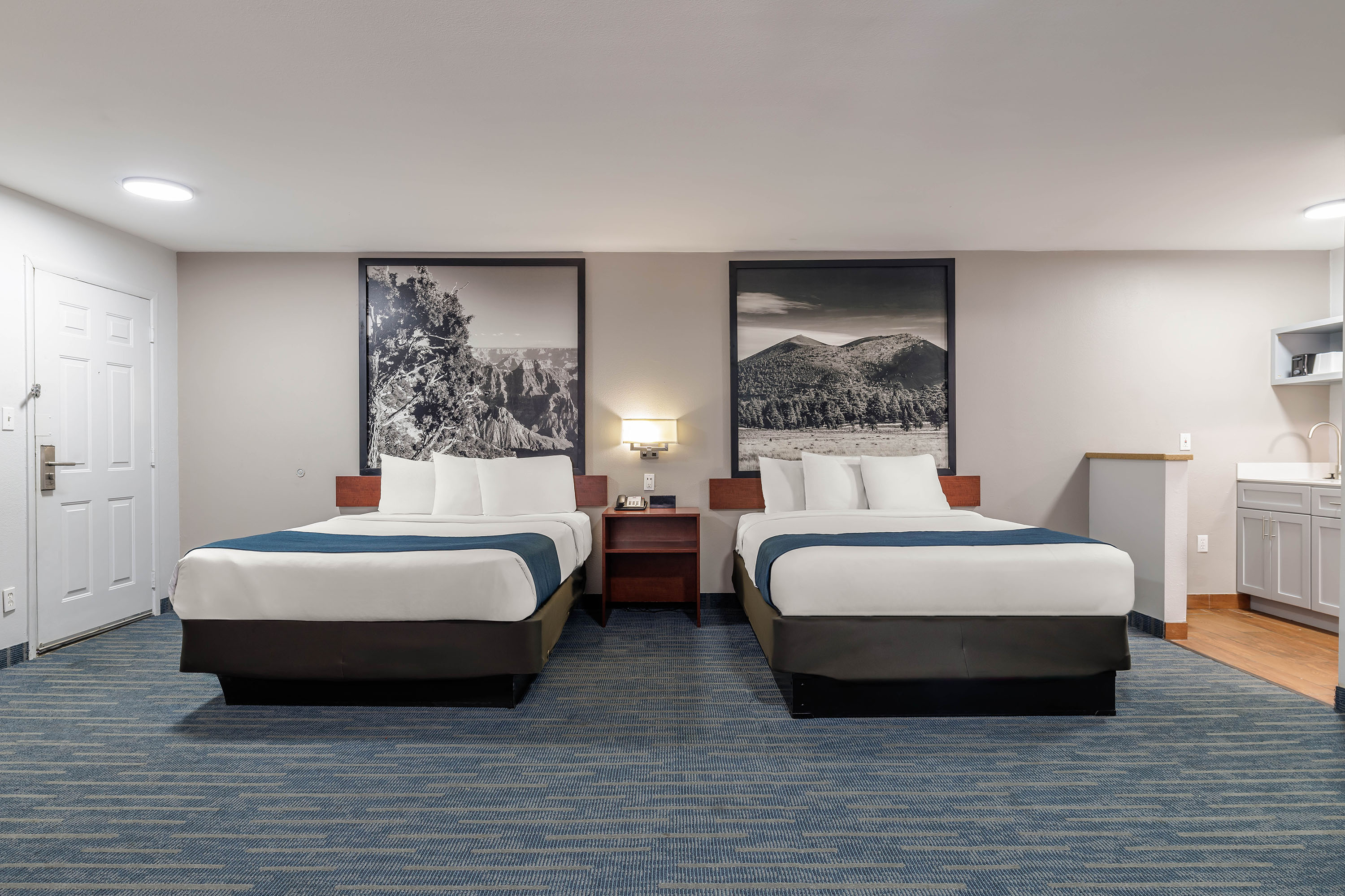 Guest room at the Days Inn & Suites by Wyndham Flagstaff Near University in Flagstaff, Arizona