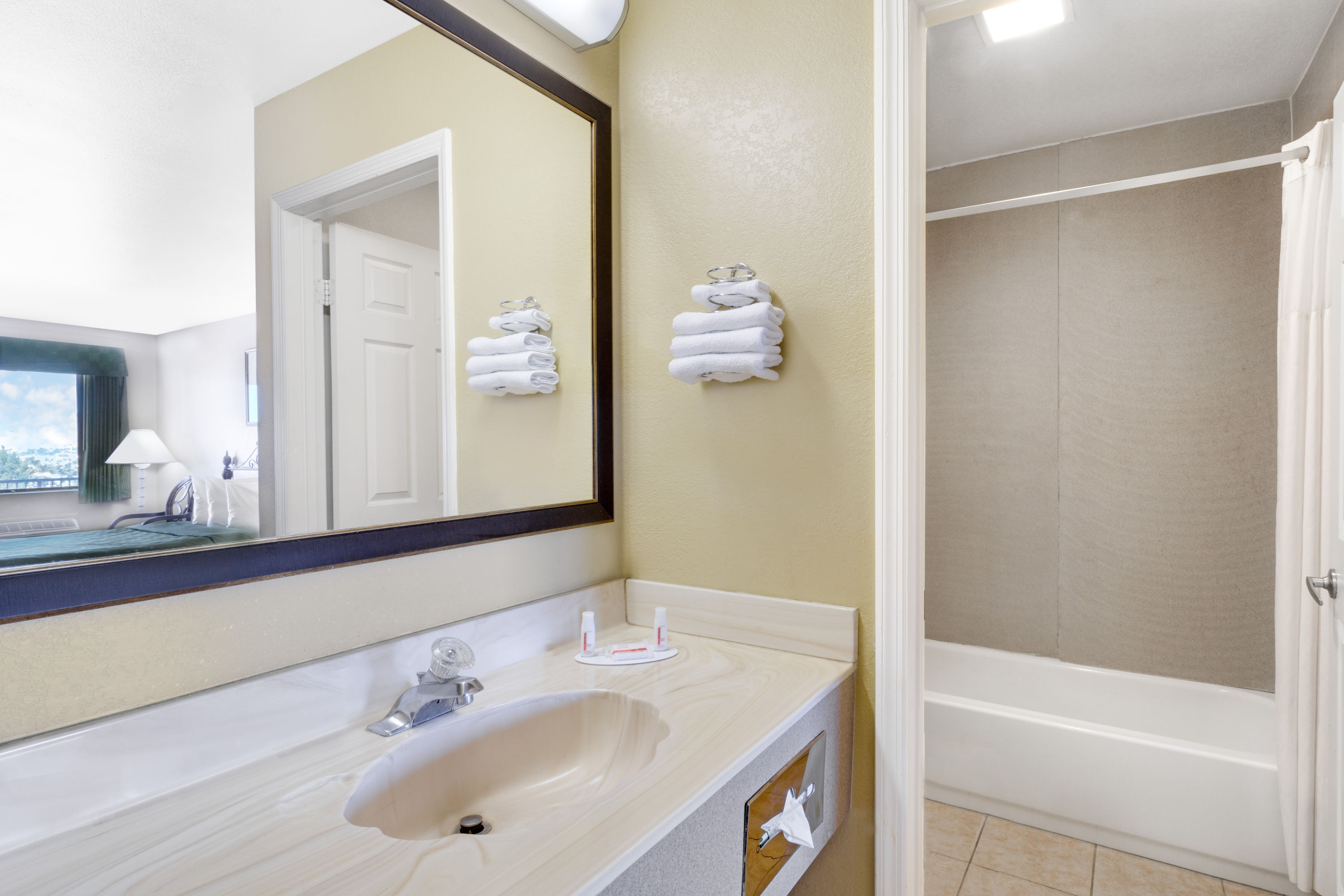 Guest room bath at the Days Inn by Wyndham Kingman East in Kingman, Arizona
