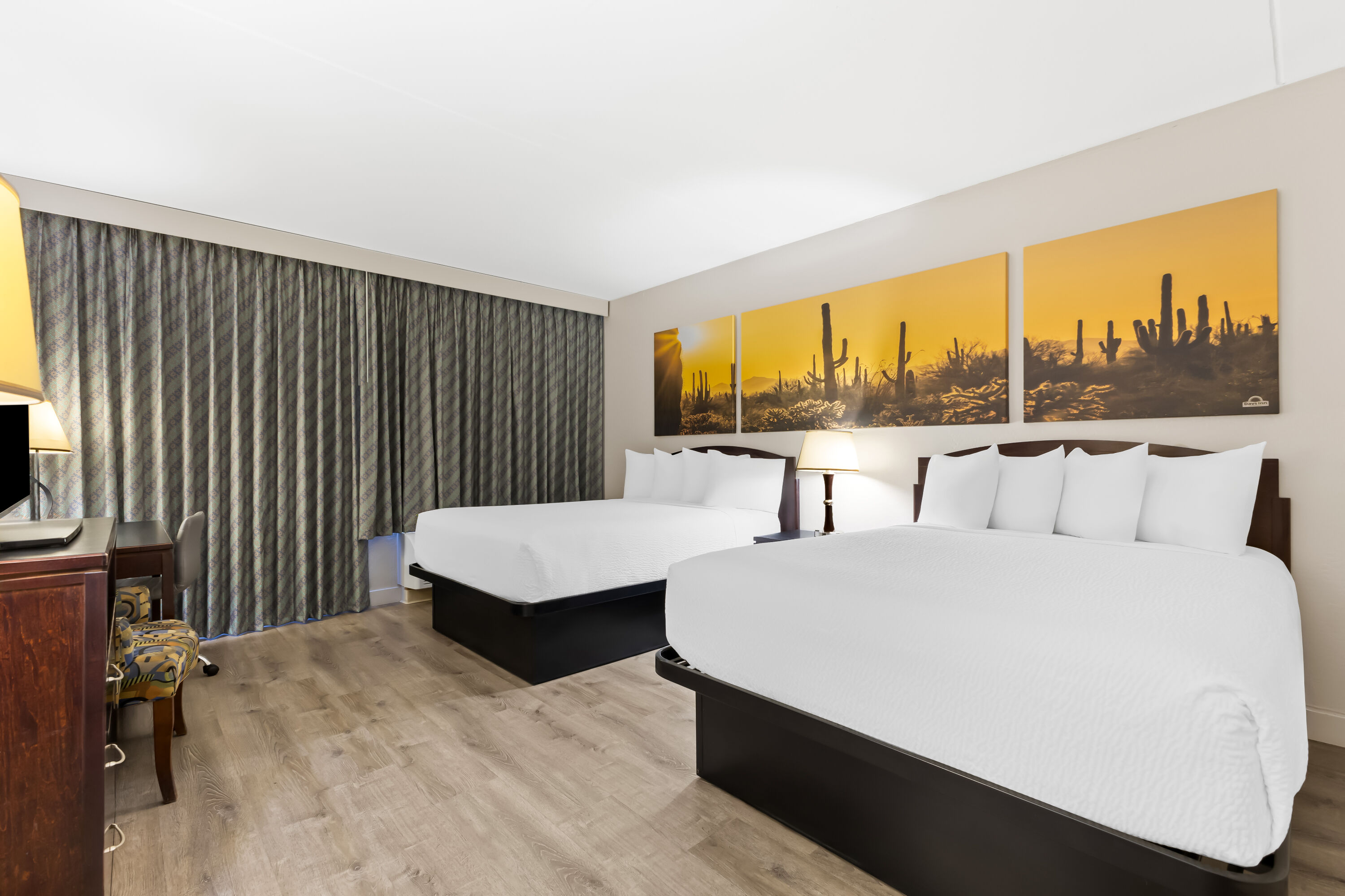 Double bed guest room at the Days Inn & Suites by Wyndham Mesa Near Phoenix in Mesa, Arizona