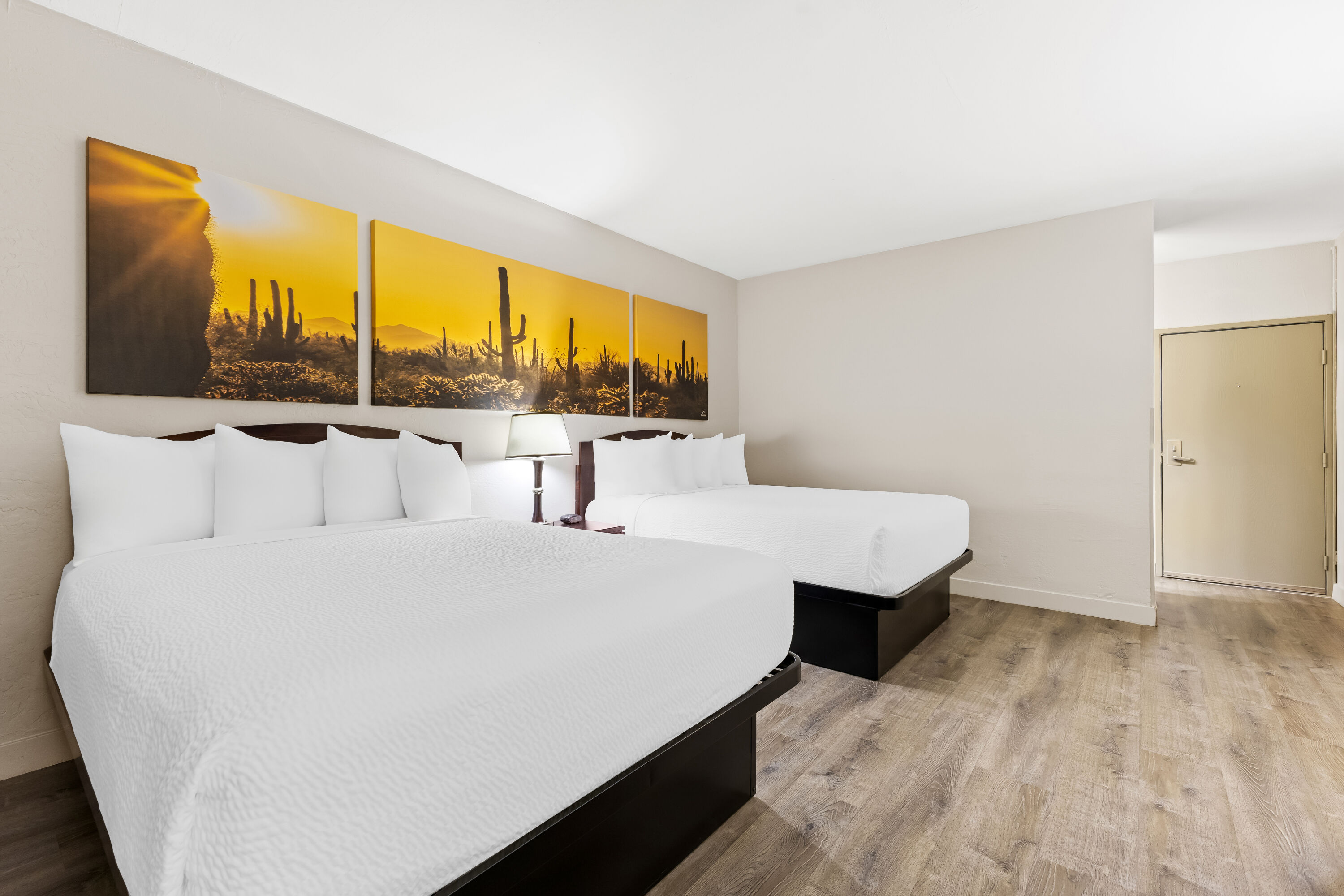 Double bed guest room at the Days Inn & Suites by Wyndham Mesa Near Phoenix in Mesa, Arizona