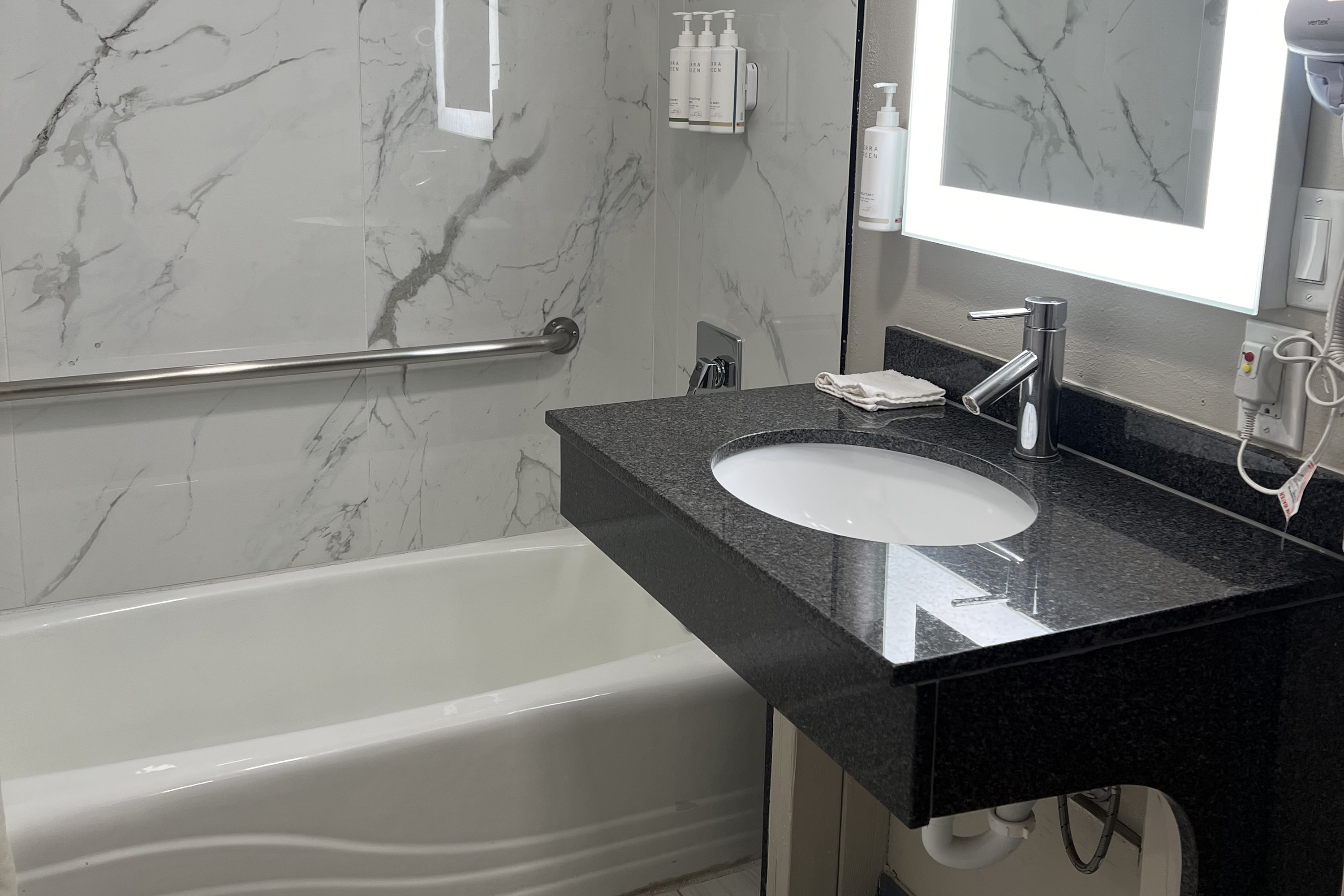 Guest room bath at the Days Inn by Wyndham Payson in Payson, Arizona