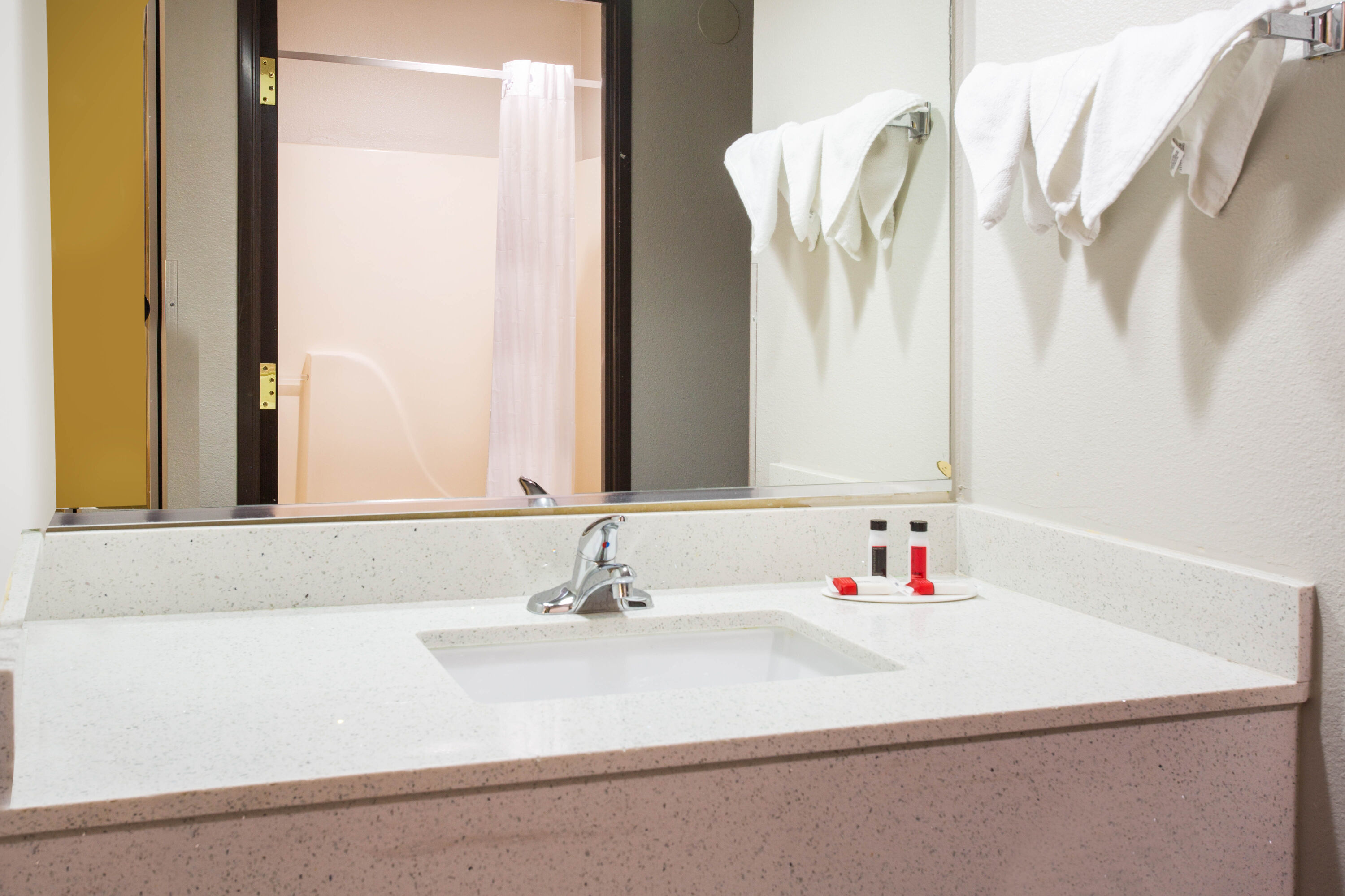 Guest room bath at the Days Inn by Wyndham Phoenix North in Phoenix, Arizona
