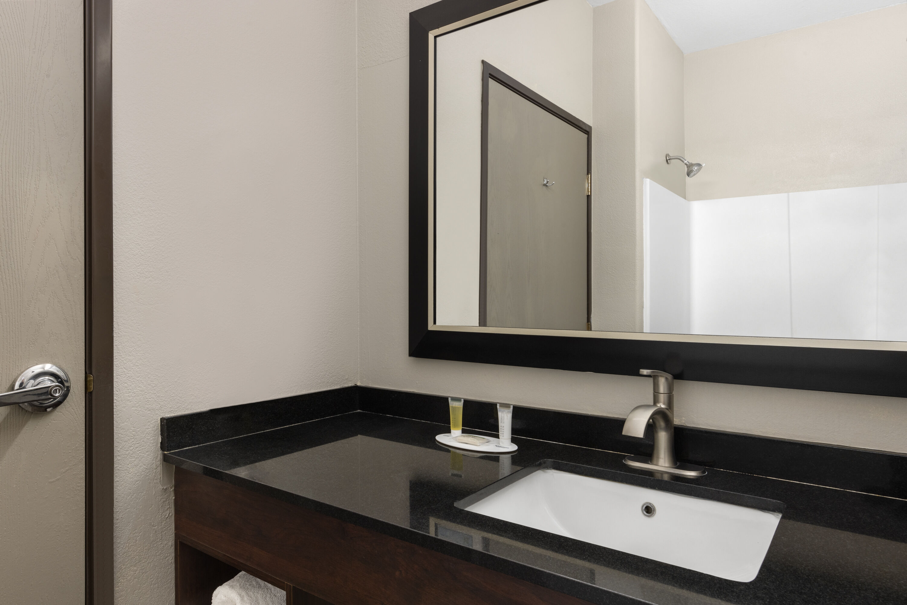 Guest room bath at the Days Inn & Suites by Wyndham Tucson/Marana in Tucson, Arizona