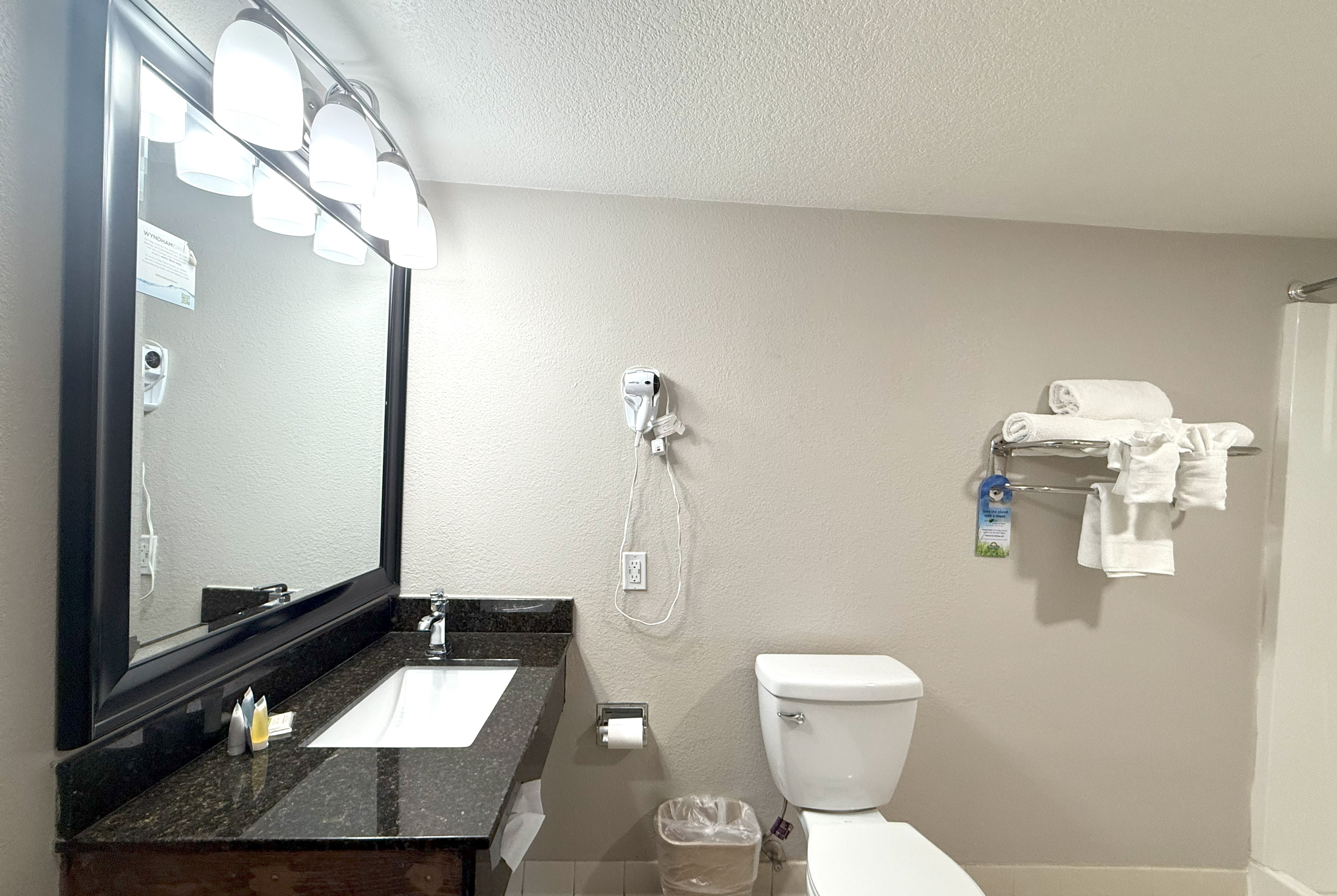 Guest room bath at the Days Inn by Wyndham Yuma in Yuma, Arizona
