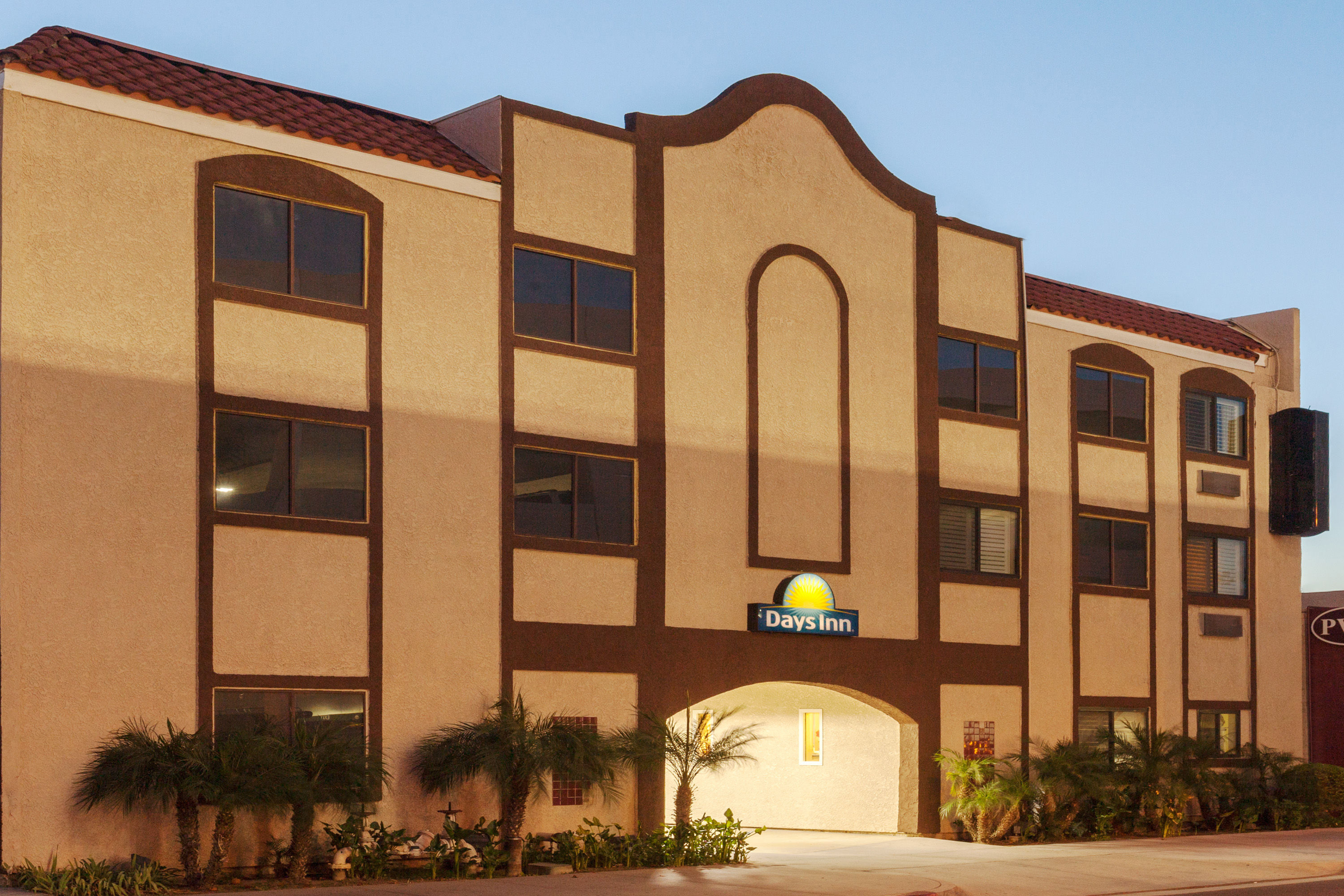 Exterior Dusk Image of Days Inn by Wyndham Alhambra CA hotel in Alhambra, California