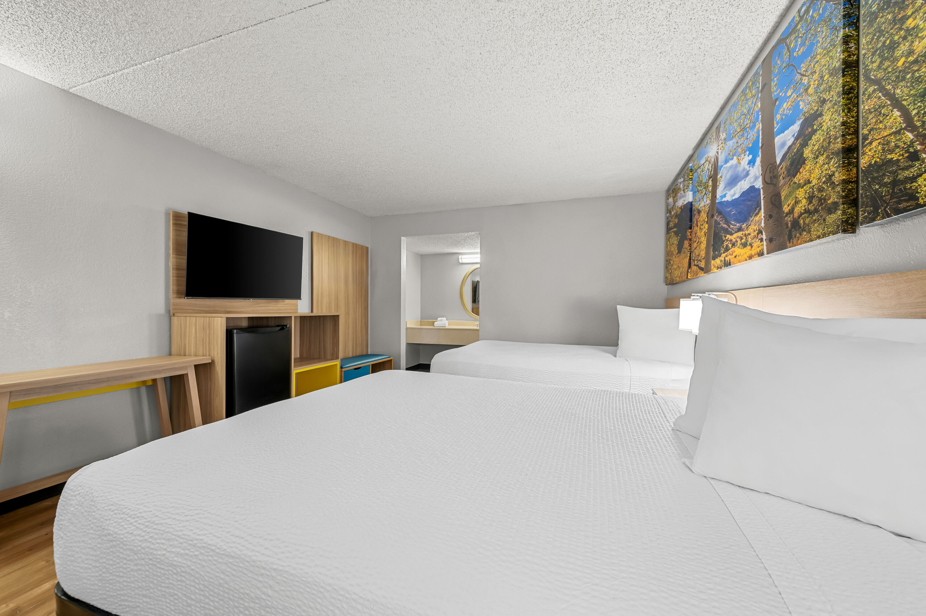 Double bed guest room at the Days Inn by Wyndham Buena Park in Buena Park, California