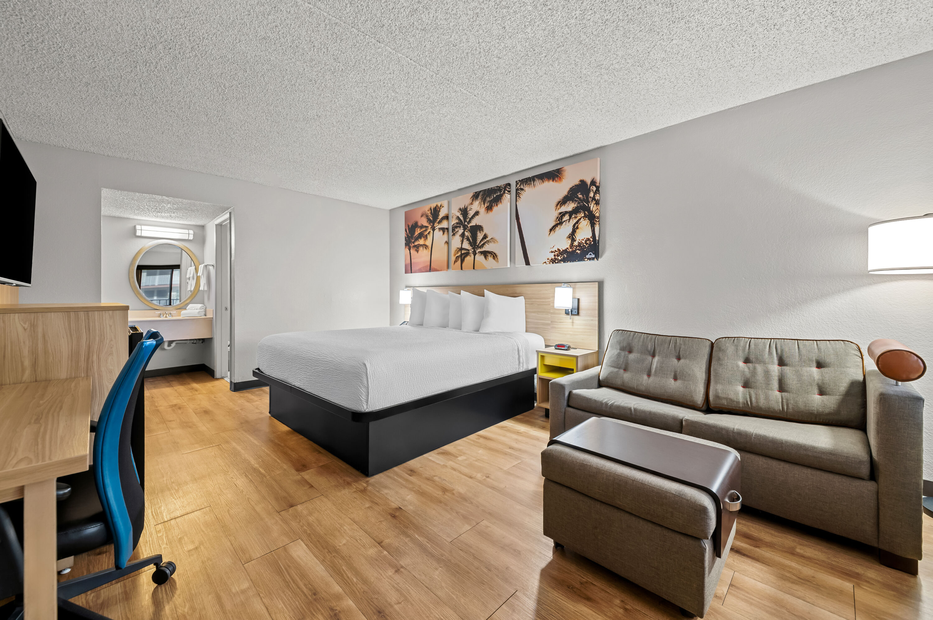 King bed guest room at the Days Inn by Wyndham Buena Park in Buena Park, California