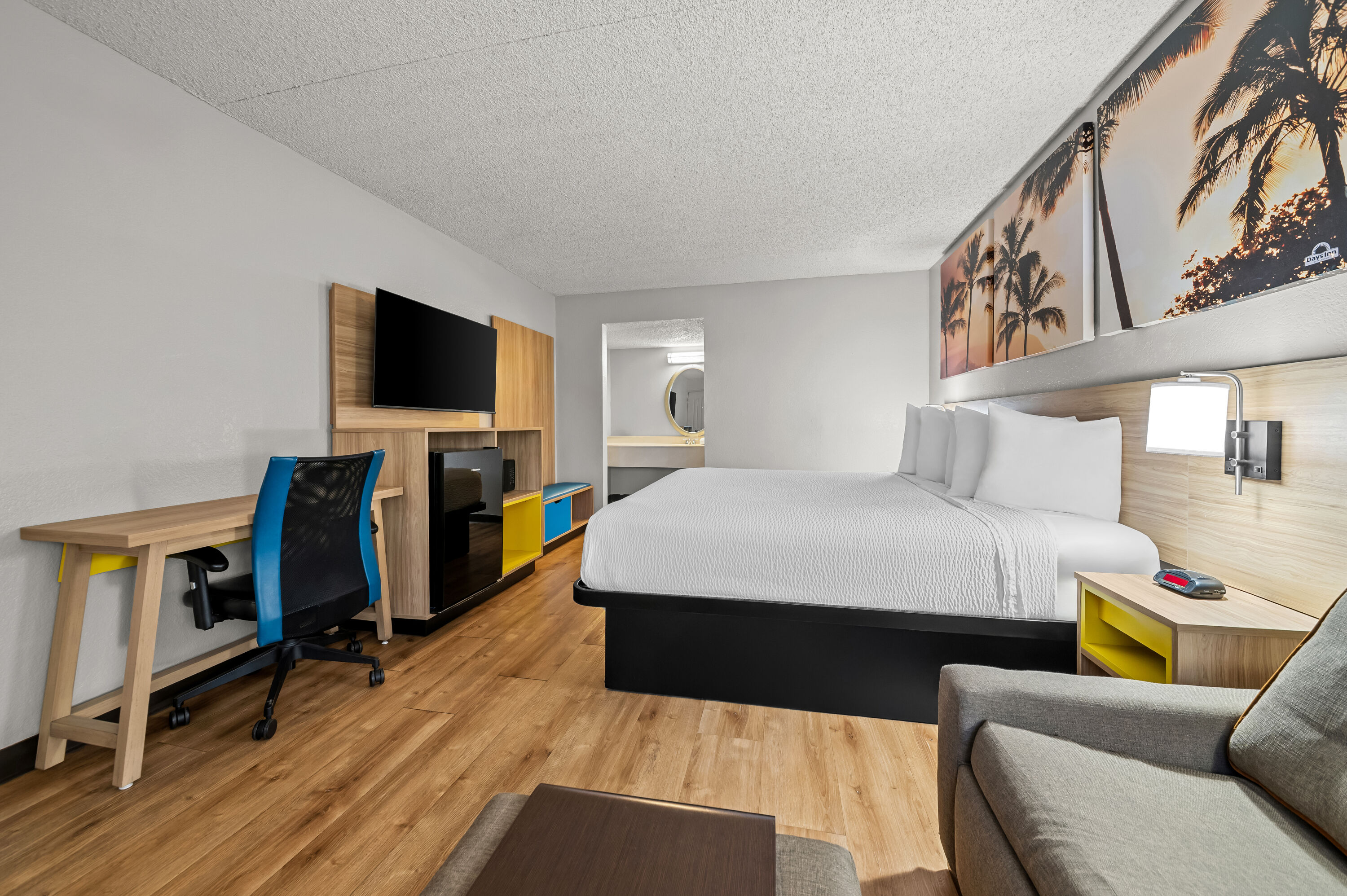 King bed guest room at the Days Inn by Wyndham Buena Park in Buena Park, California