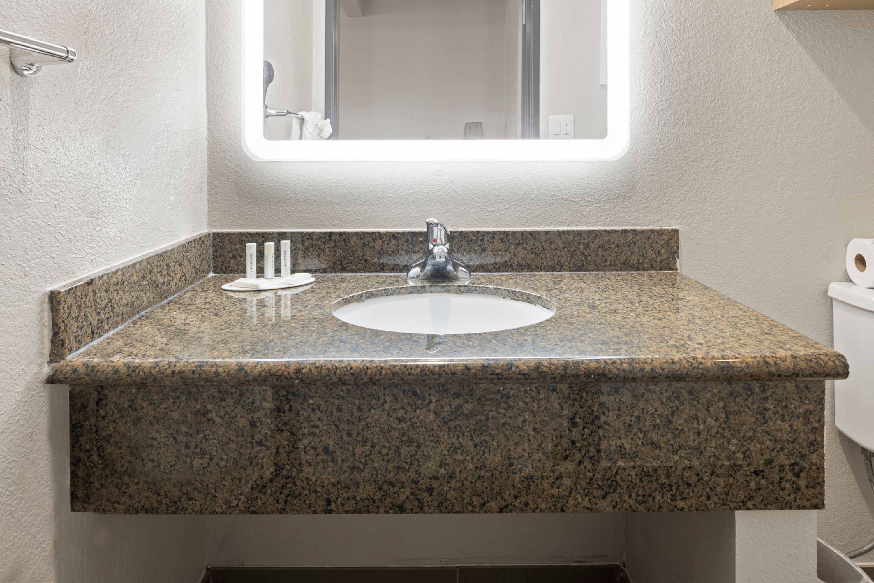 Guest room bath at the Days Inn by Wyndham San Diego-East/El Cajon in El Cajon, California