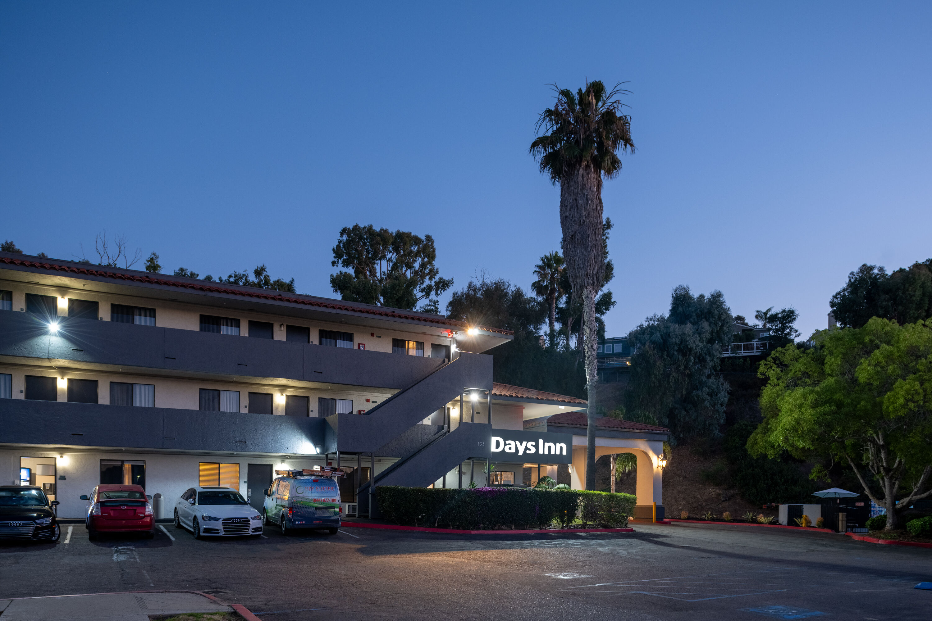 Exterior Dusk Image of Days Inn by Wyndham Encinitas Moonlight Beach hotel in Encinitas, California