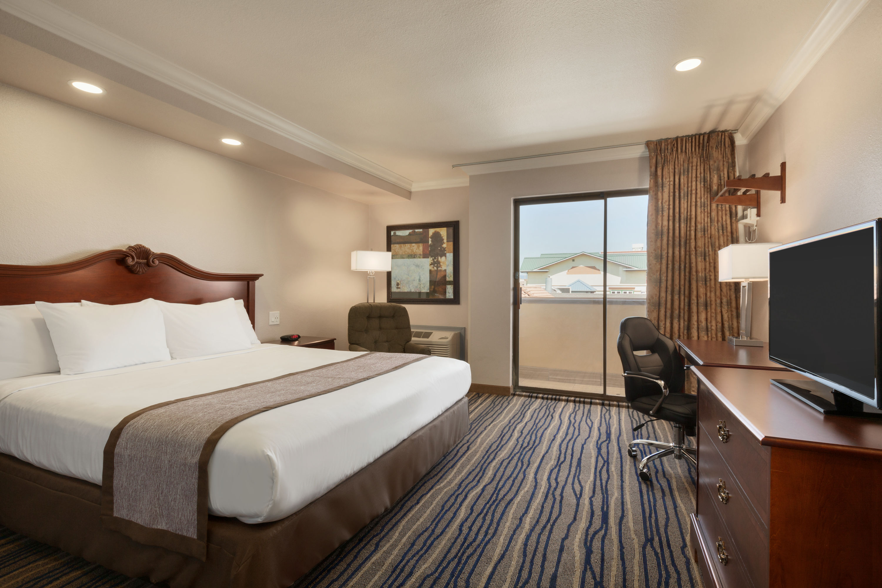 King bed guest room at the Days Inn by Wyndham Eureka CA in Eureka, California