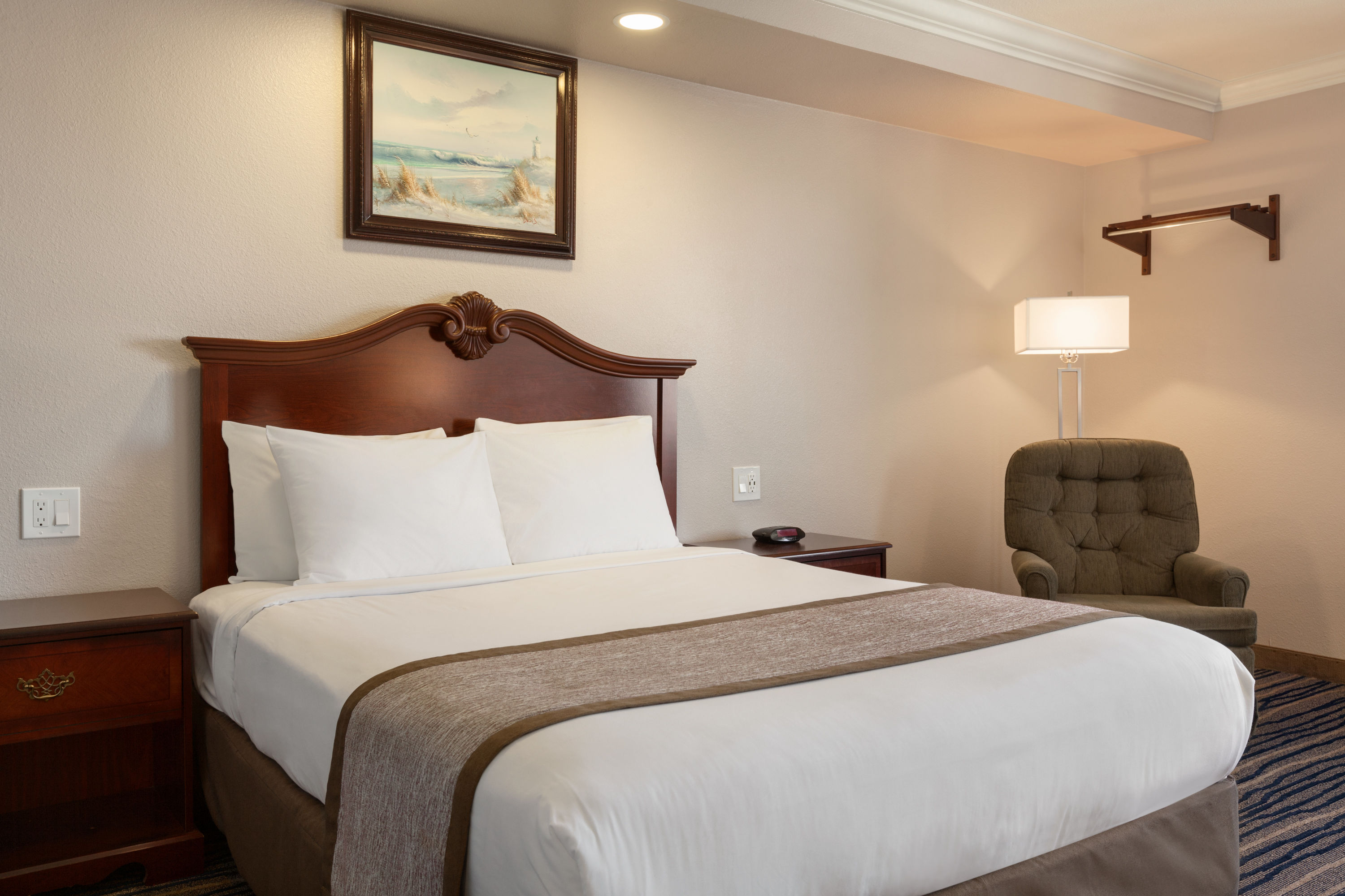 Queen bed guest room at the Days Inn by Wyndham Eureka CA in Eureka, California