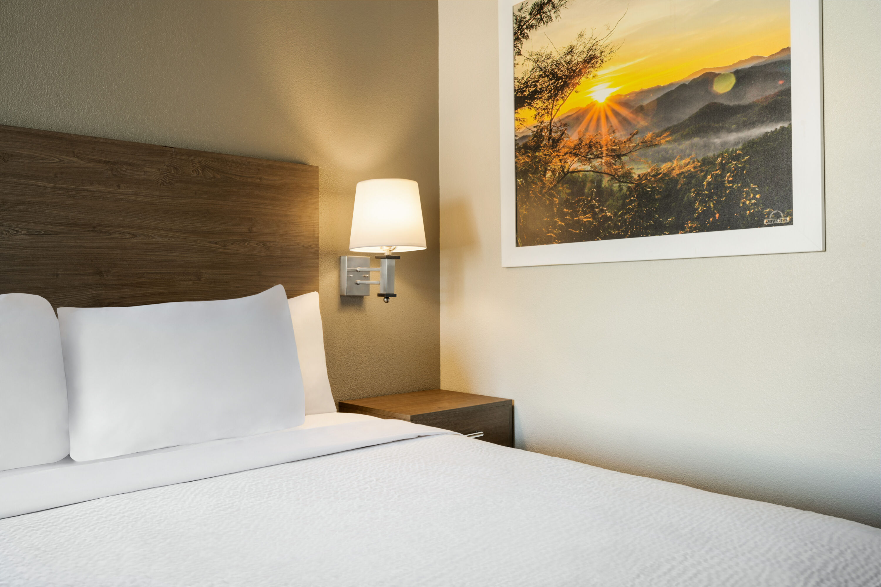 Guest room at the Days Inn by Wyndham Fresno South in Fresno, California