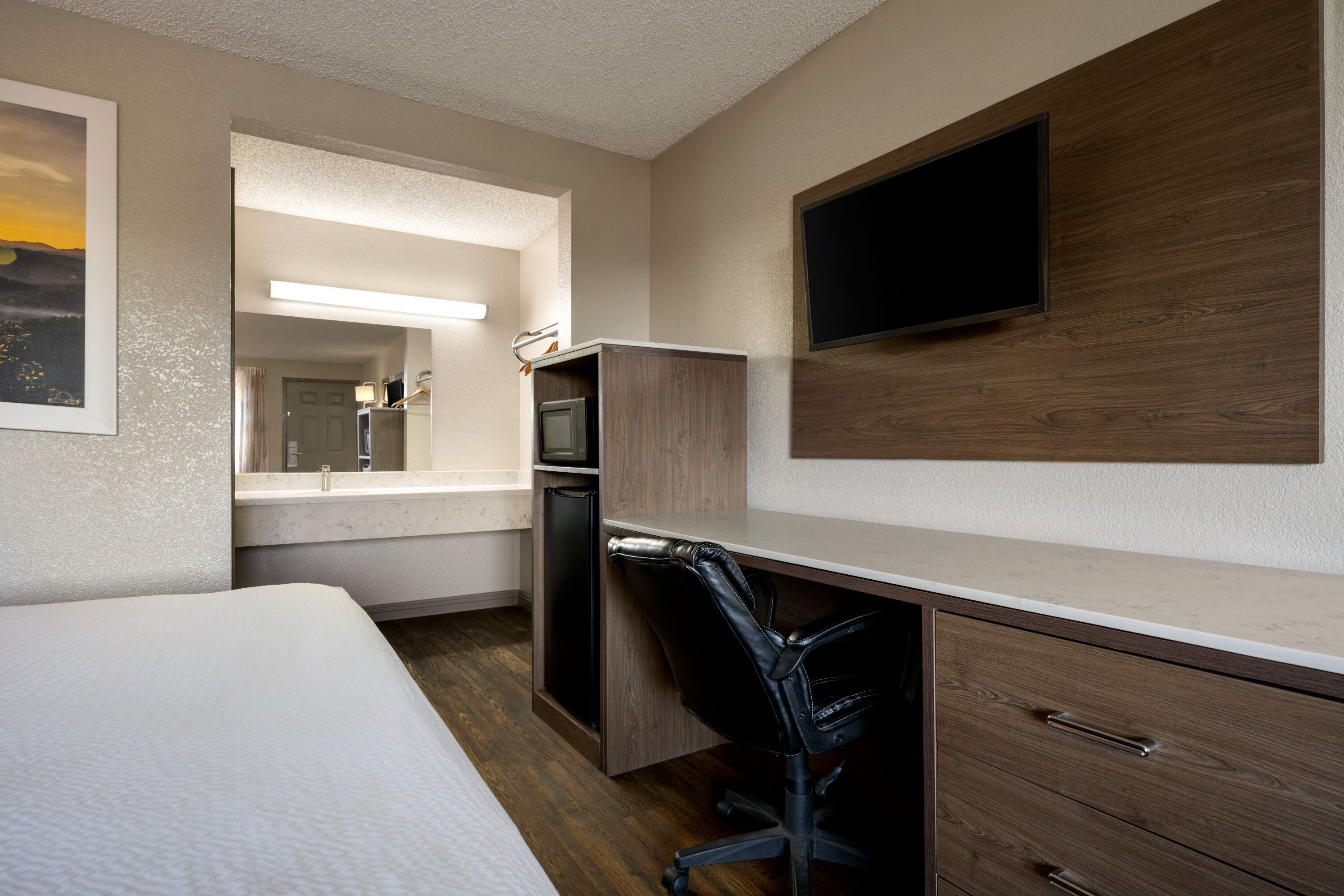 Guest room at the Days Inn by Wyndham Fresno South in Fresno, California