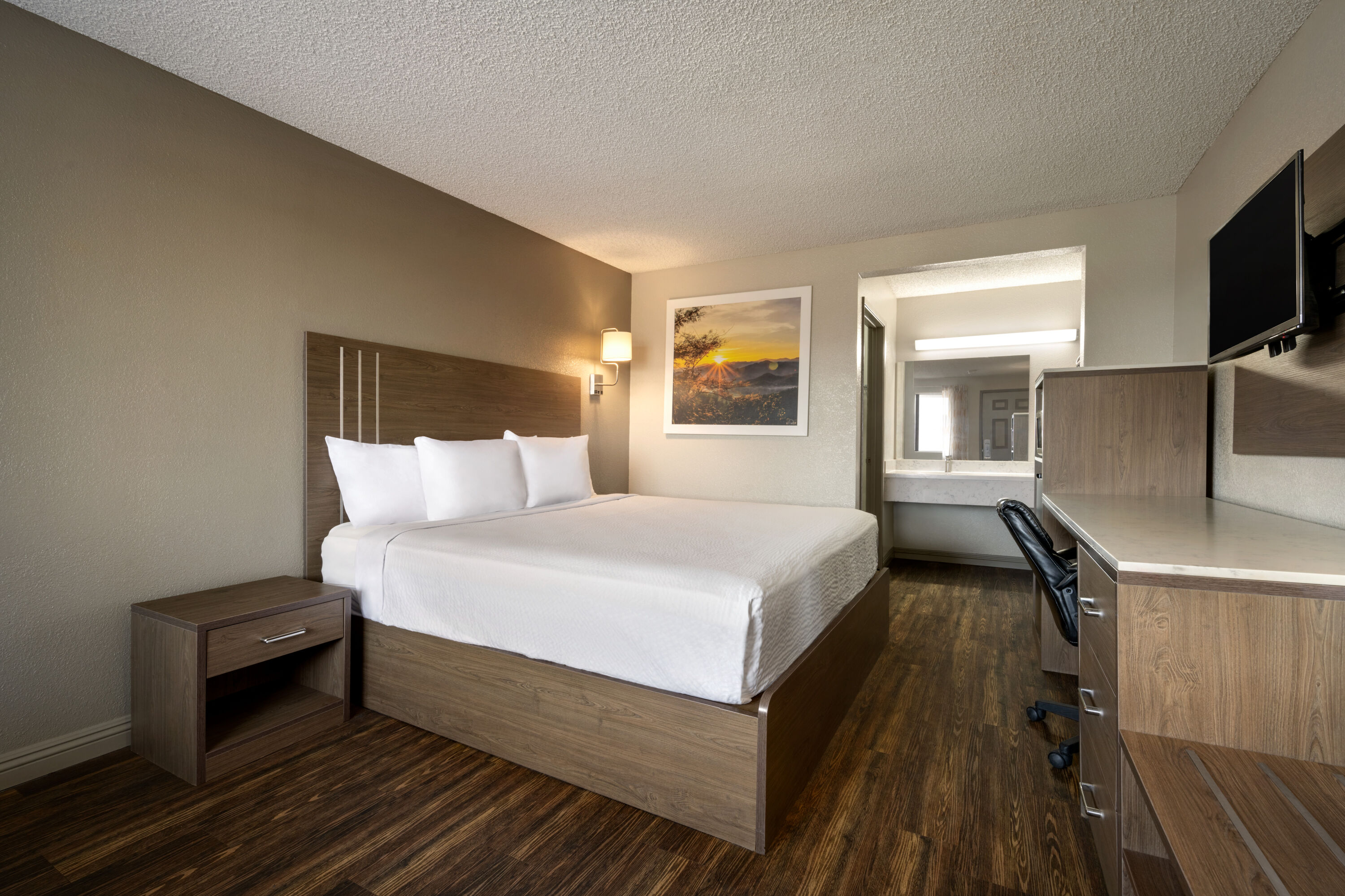 Guest room at the Days Inn by Wyndham Fresno South in Fresno, California