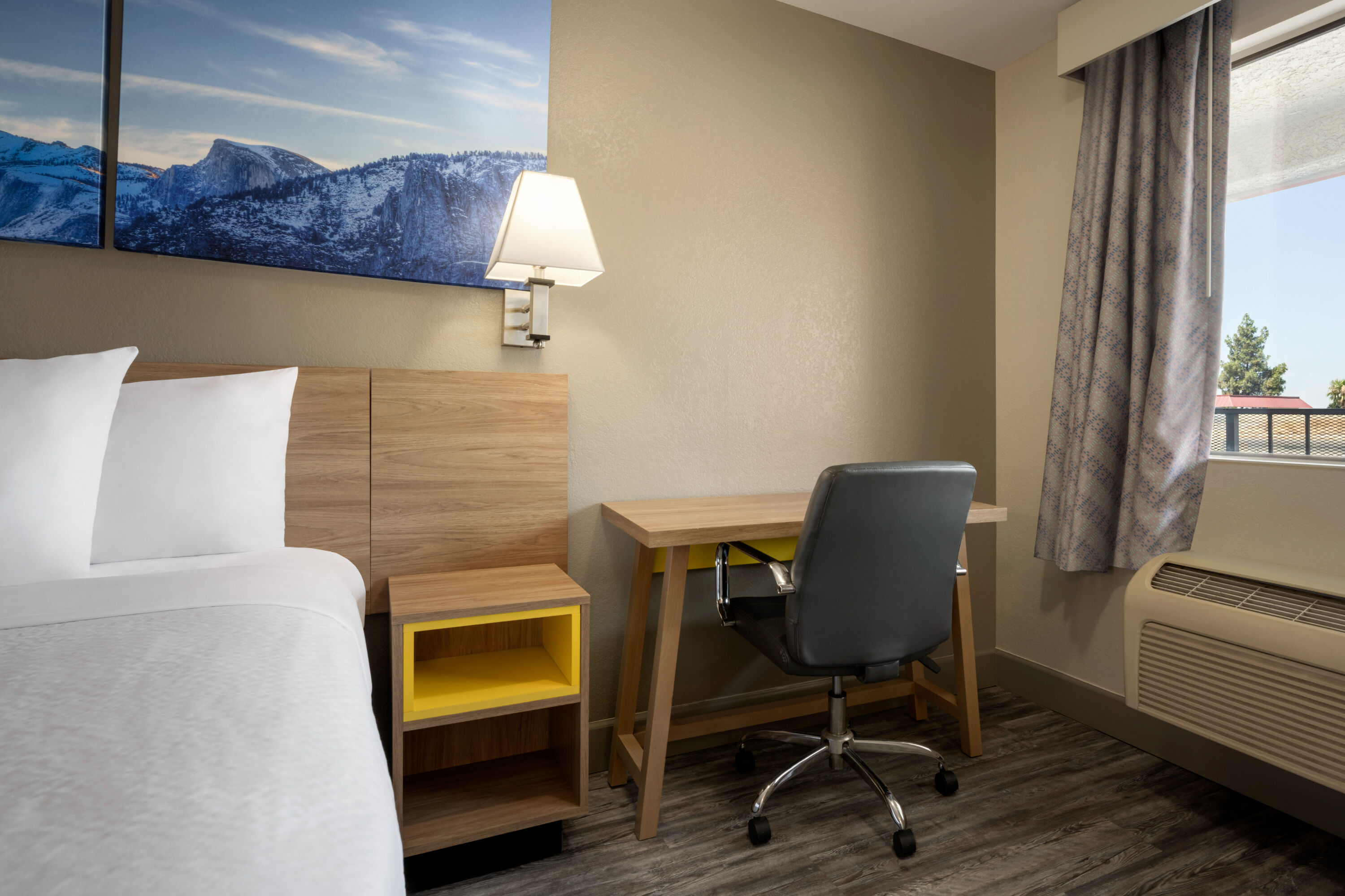 Guest room at the Days Inn by Wyndham Fresno South in Fresno, California