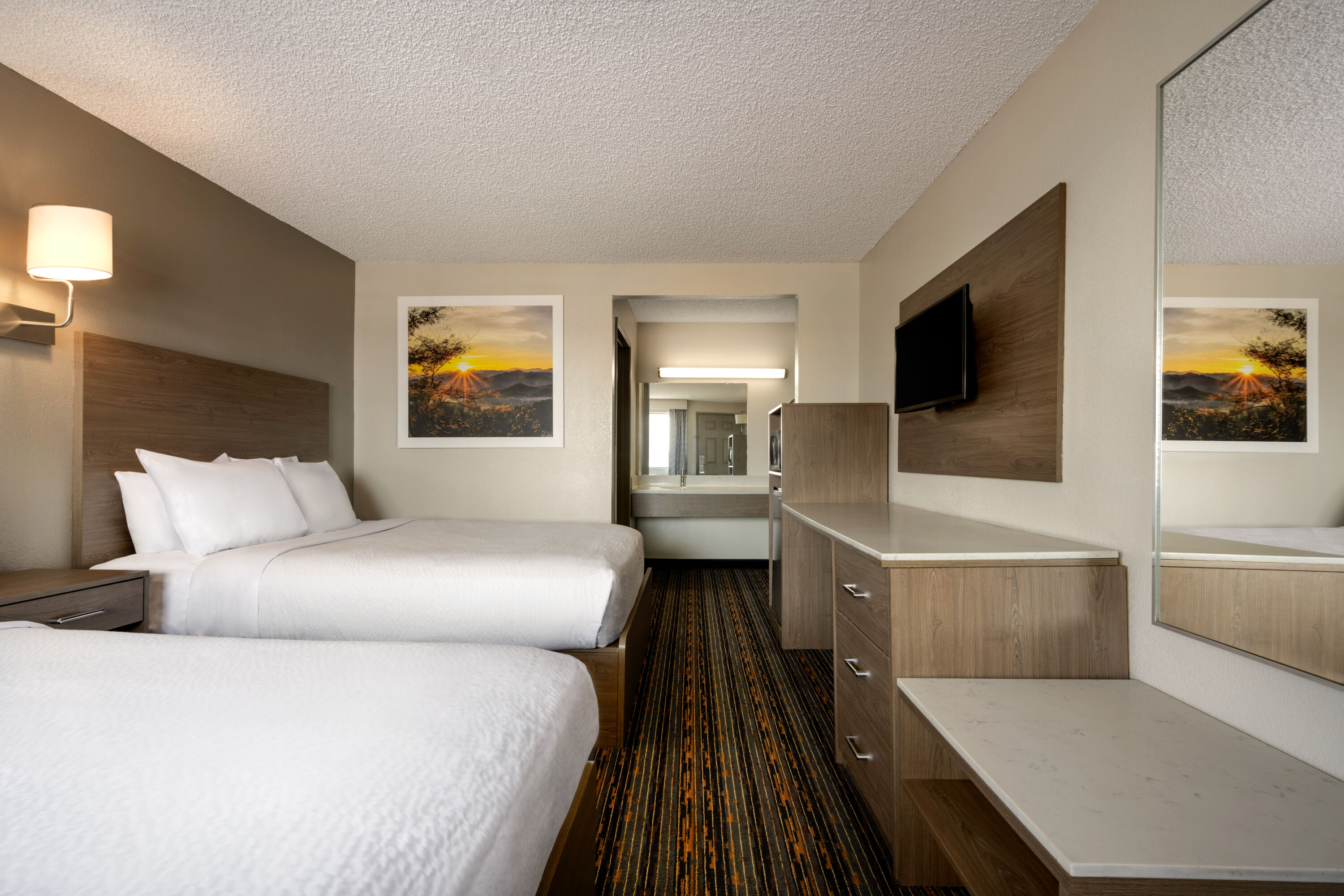 Guest room at the Days Inn by Wyndham Fresno South in Fresno, California