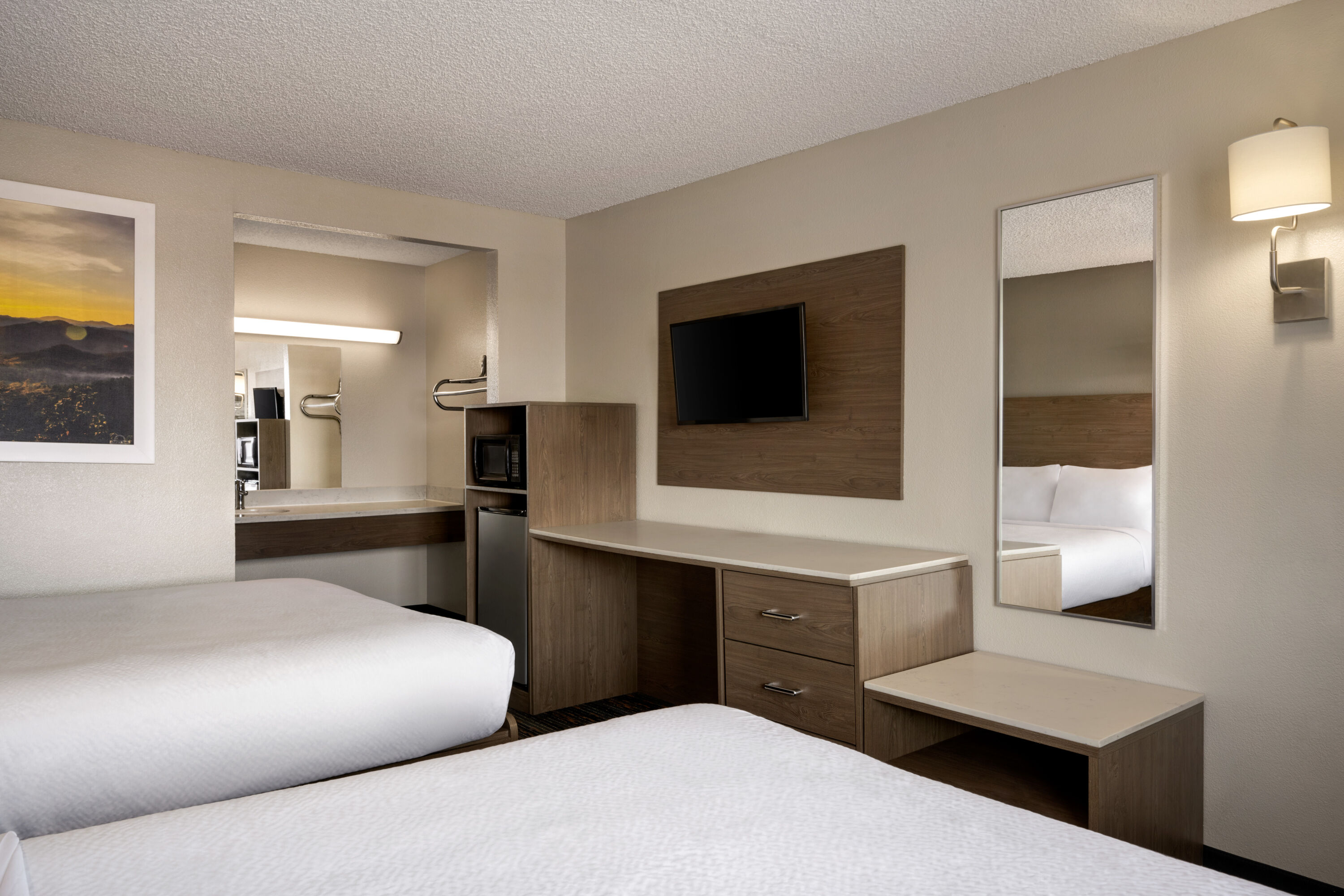 Guest room at the Days Inn by Wyndham Fresno South in Fresno, California