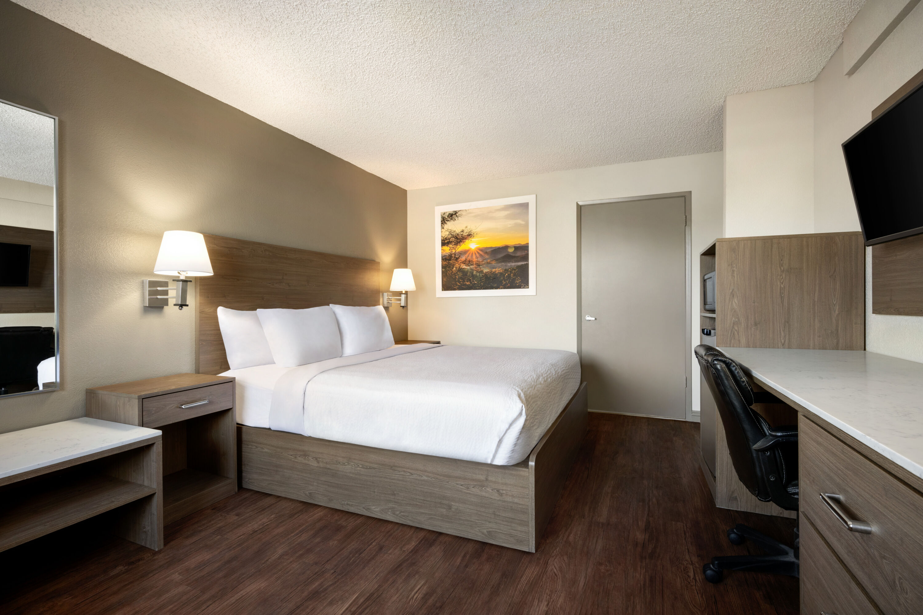 Guest room at the Days Inn by Wyndham Fresno South in Fresno, California