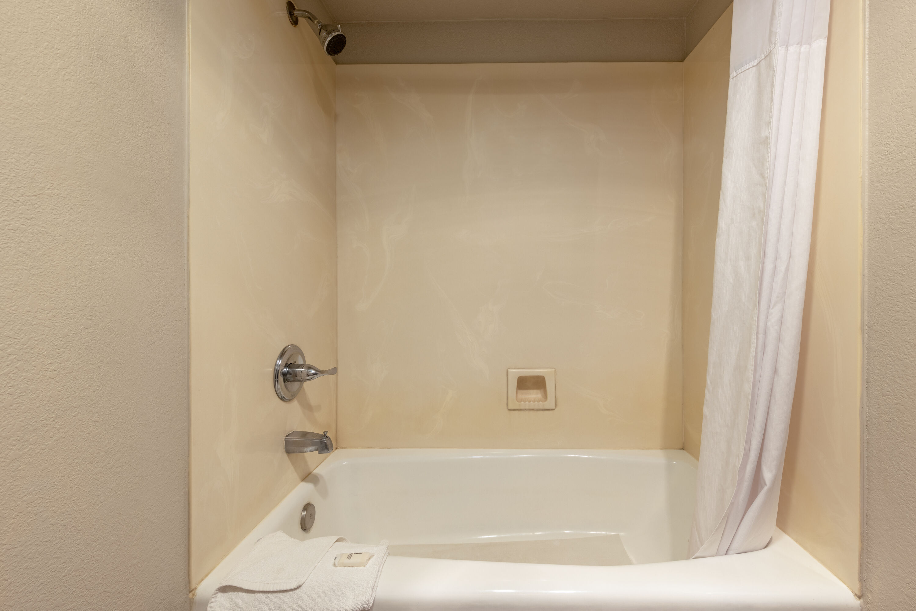 Guest room bath at the Days Inn by Wyndham Lathrop in Lathrop, California
