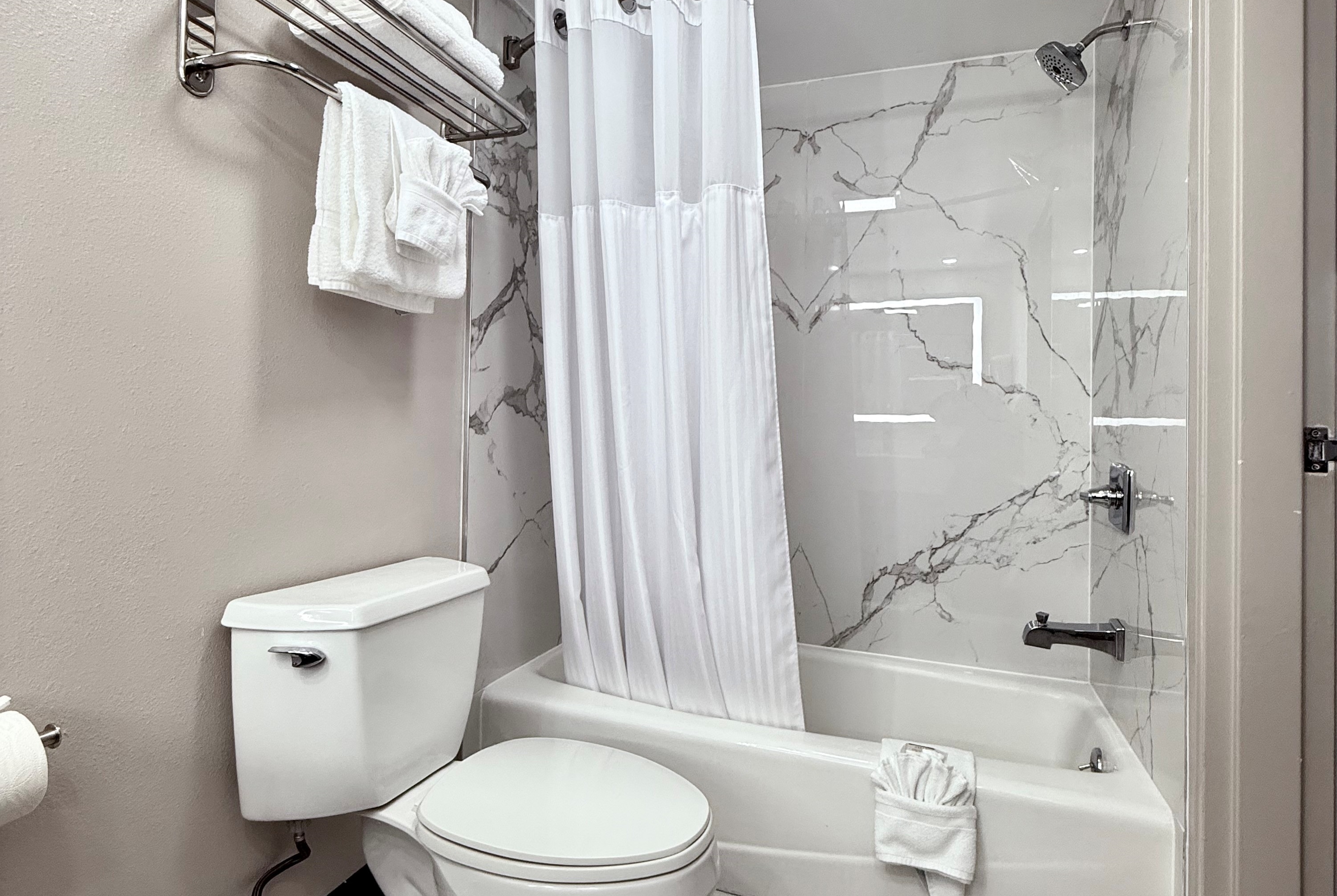 Guest room bath at the Days Inn by Wyndham Los Angeles LAX/Redondo/Manhattan Beach in Lawndale, California