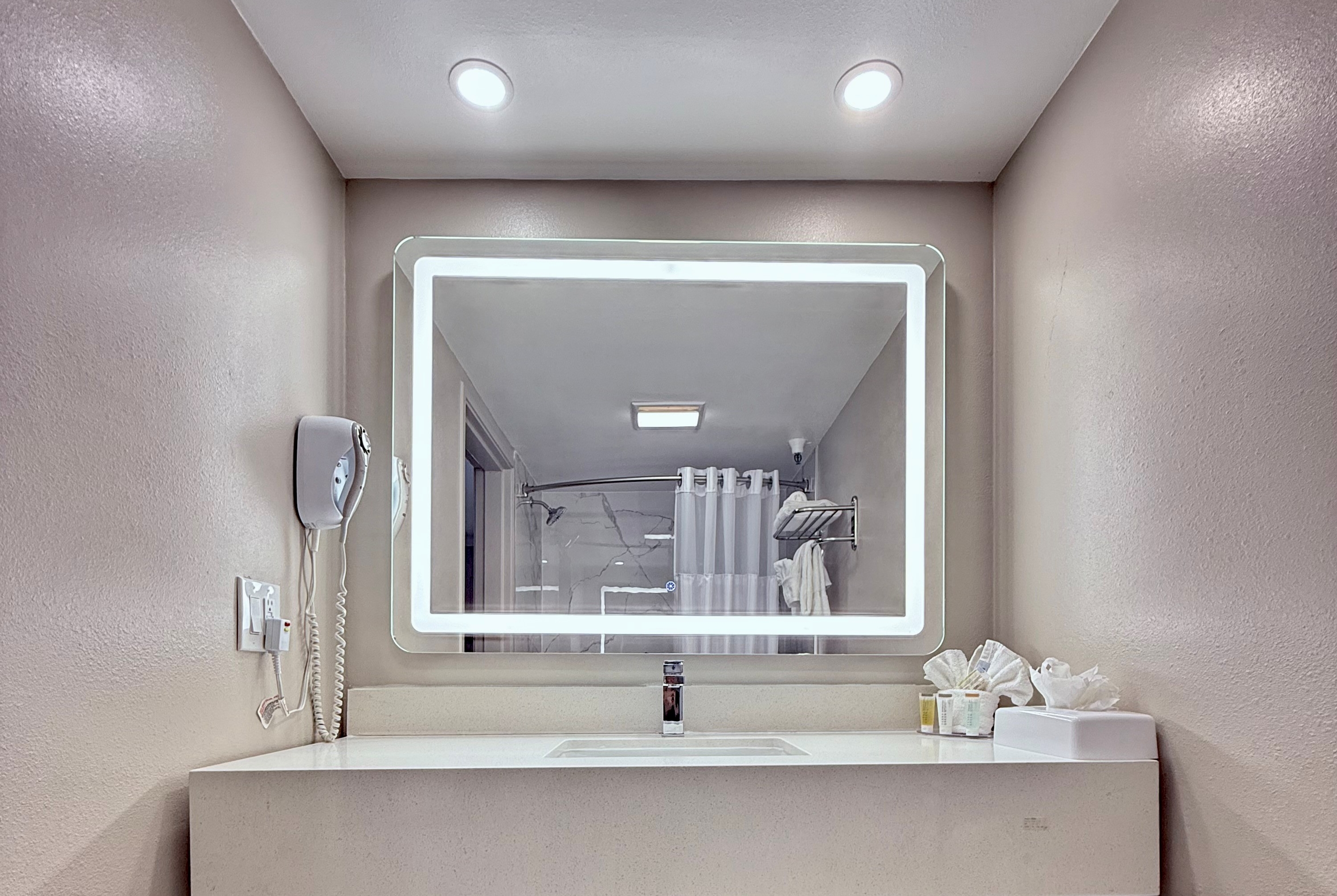 Guest room bath at the Days Inn by Wyndham Los Angeles LAX/Redondo/Manhattan Beach in Lawndale, California