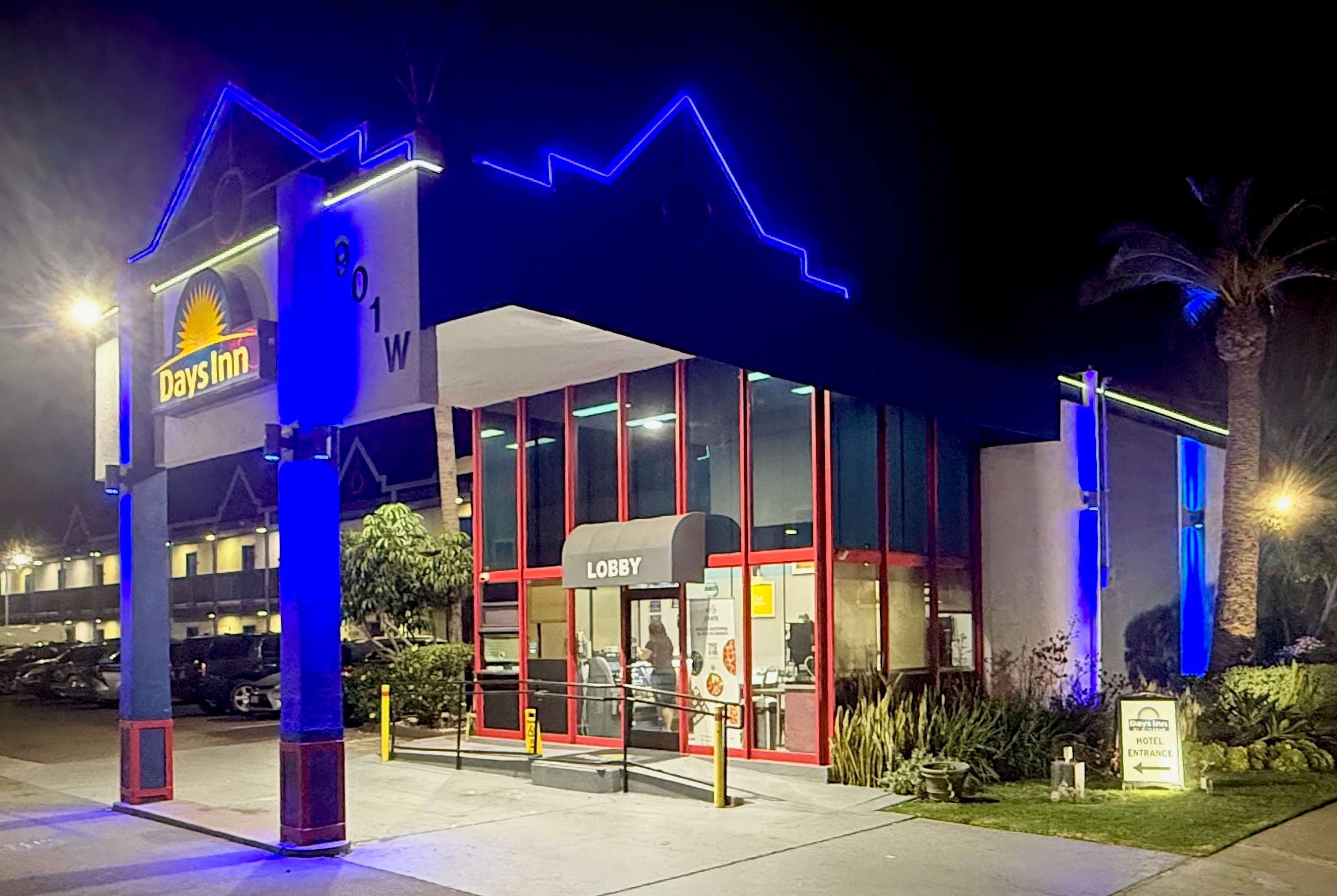 Exterior Night Image of Days Inn by Wyndham Los Angeles LAX Airport/Stadium Area hotel in Los Angeles, California