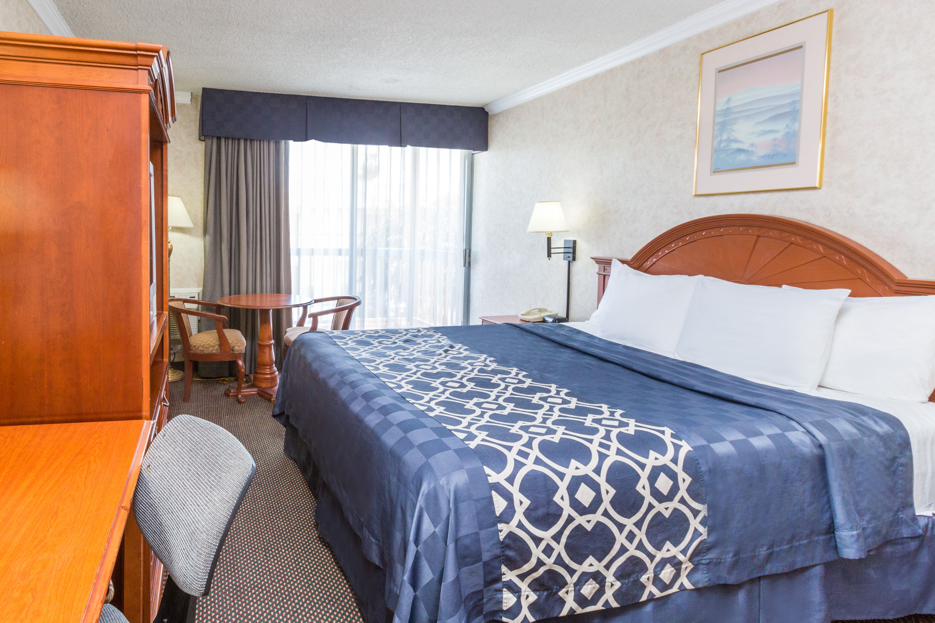 Guest room at the Days Inn by Wyndham Los Angeles Stadium Area/LAX in Los Angeles, California