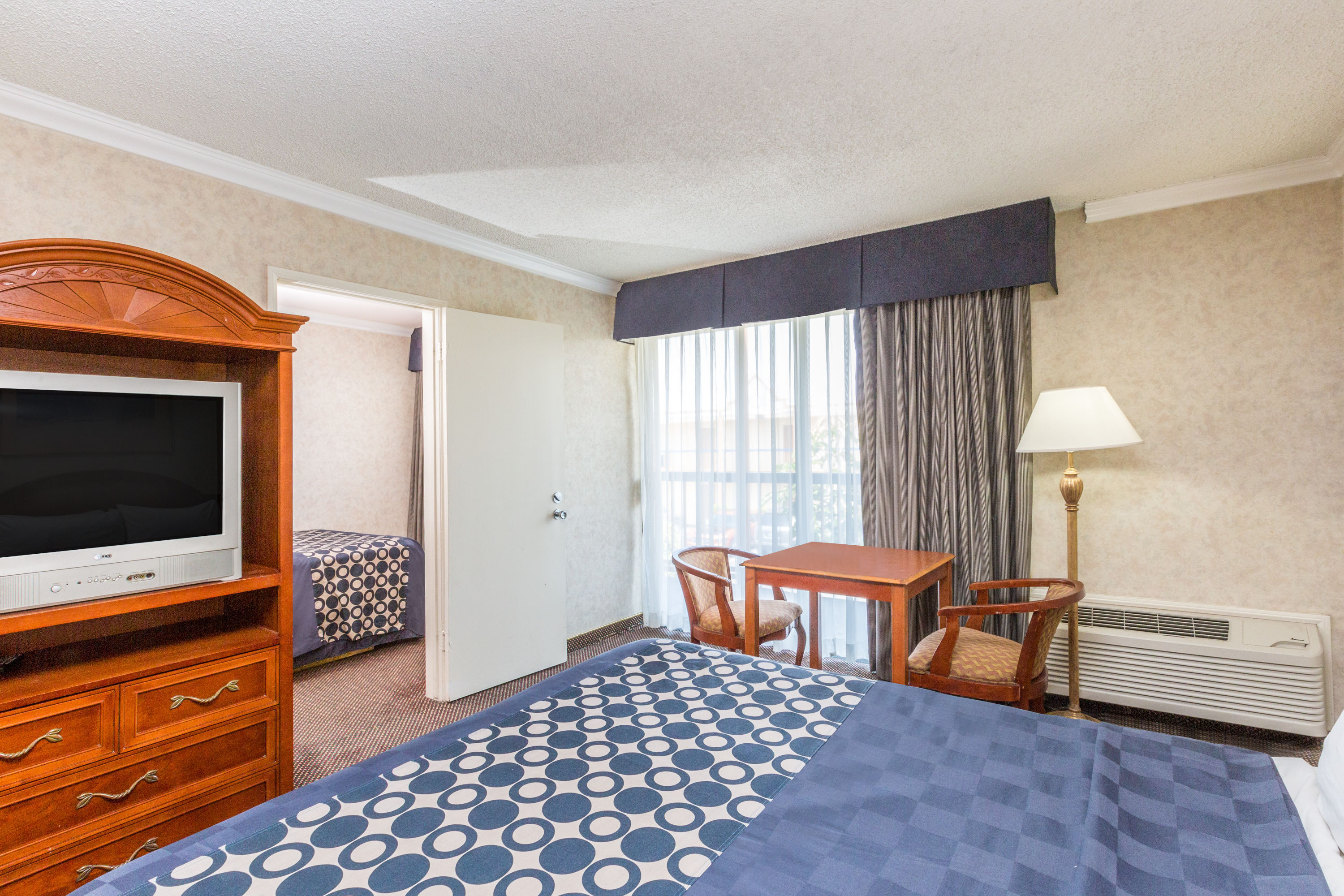 Guest room at the Days Inn by Wyndham Los Angeles Stadium Area/LAX in Los Angeles, California