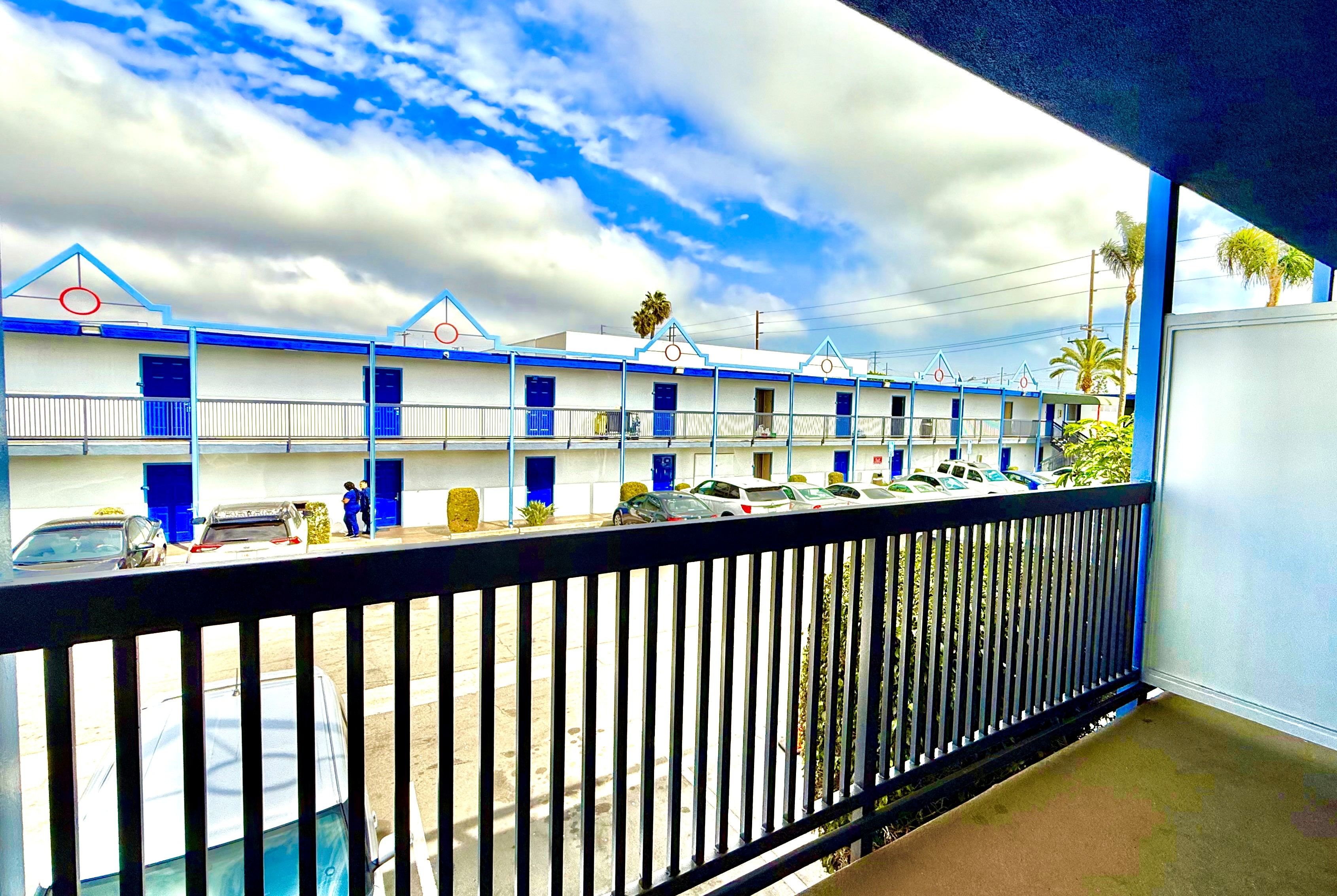 Guest room balcony at Days Inn by Wyndham Los Angeles LAX Airport/Stadium Area in Los Angeles, California