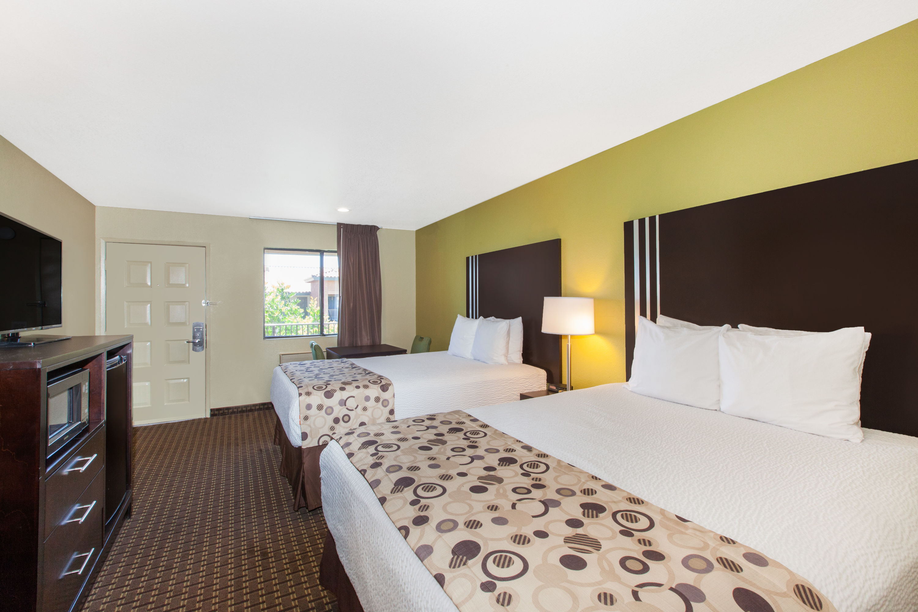 Guest room at the Days Inn by Wyndham San Jose Airport in Milpitas, California