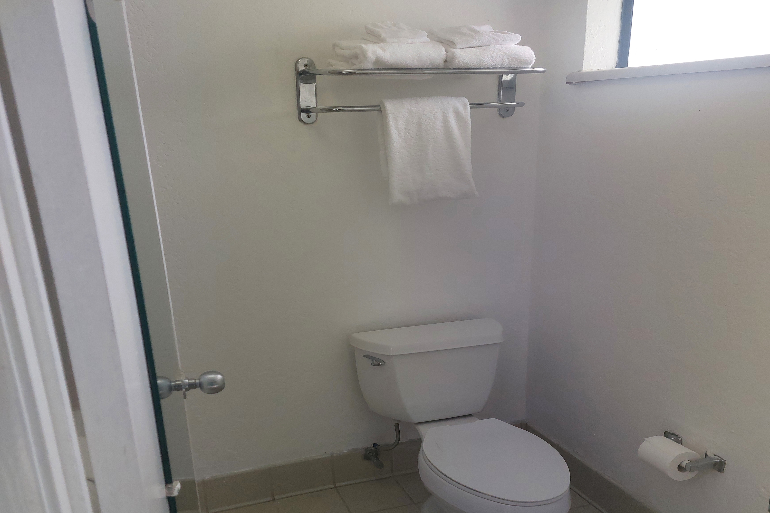 Guest room bath at the Days Inn & Suites by Wyndham Mountain View in Mountain View, California