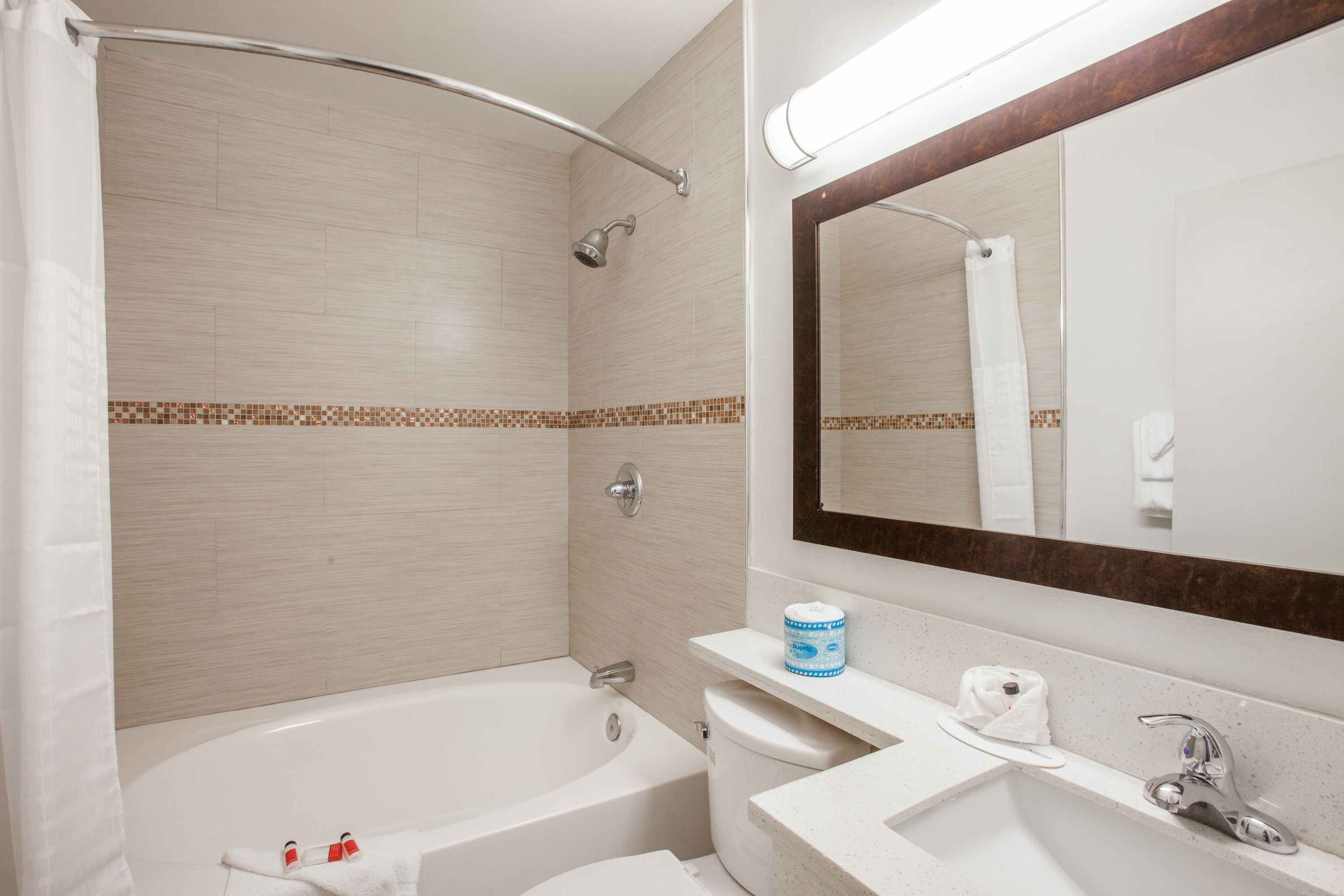 Guest room bath at the Days Inn by Wyndham Orange Anaheim in Orange, California