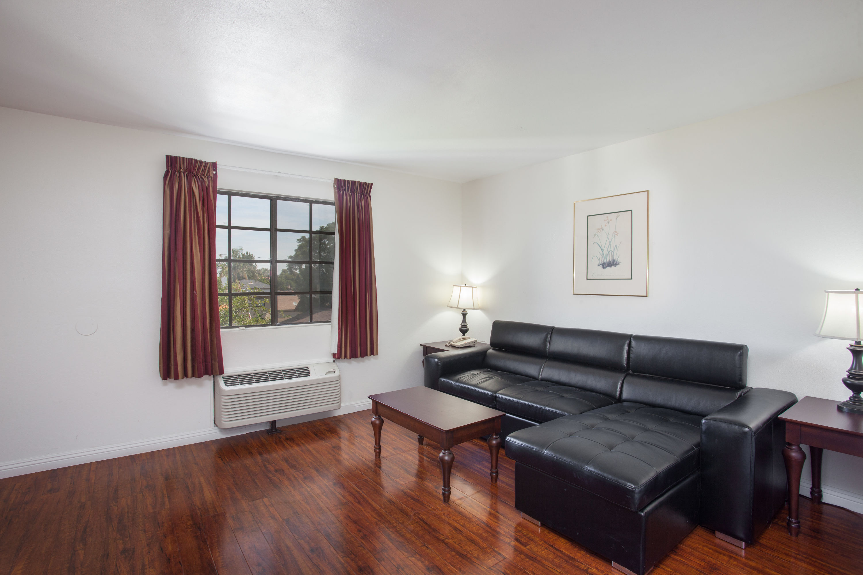 Days Inn by Wyndham Orange Anaheim suite living room in Orange, California